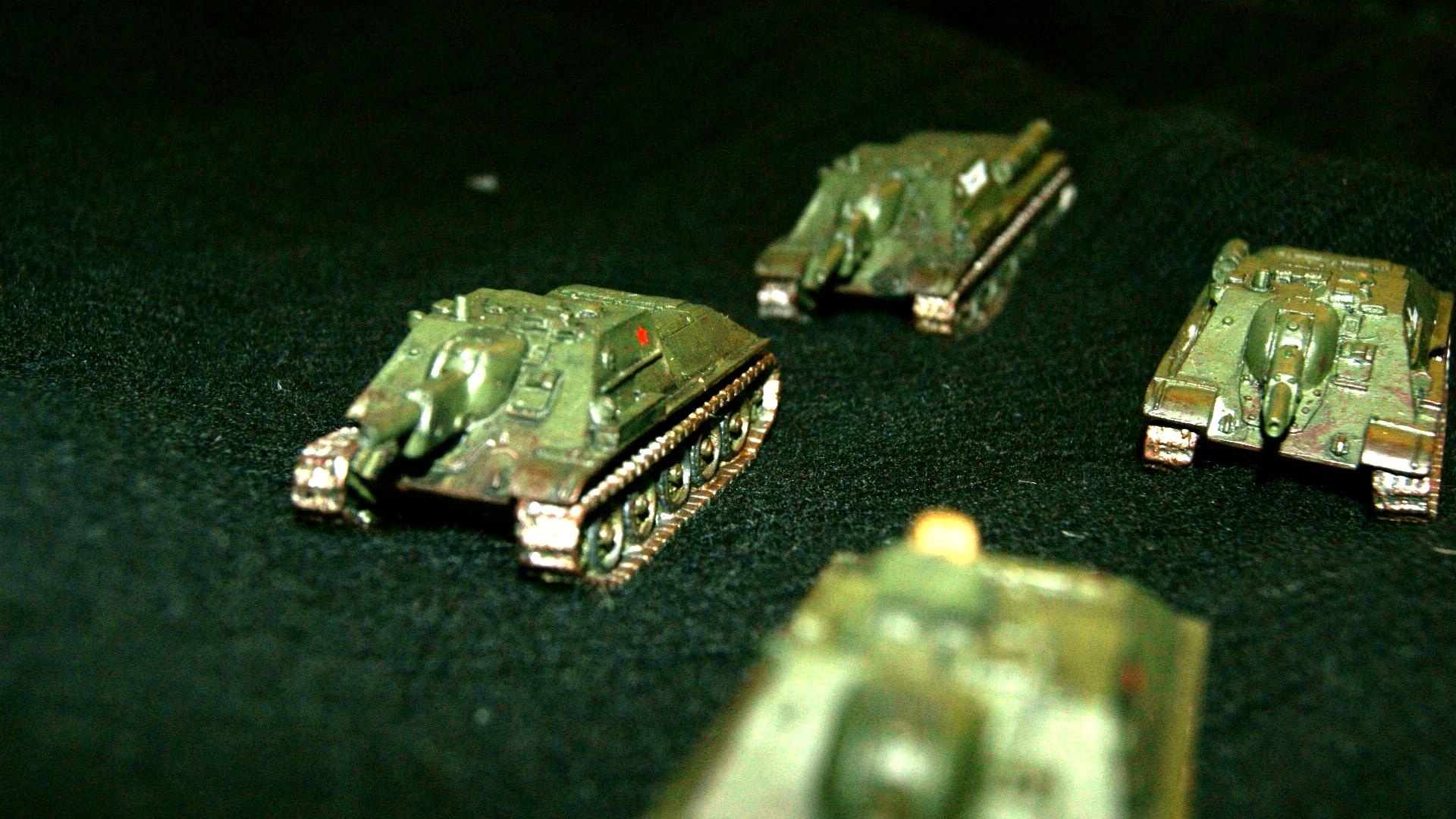 4 SU-122's rolling across a cashmere field