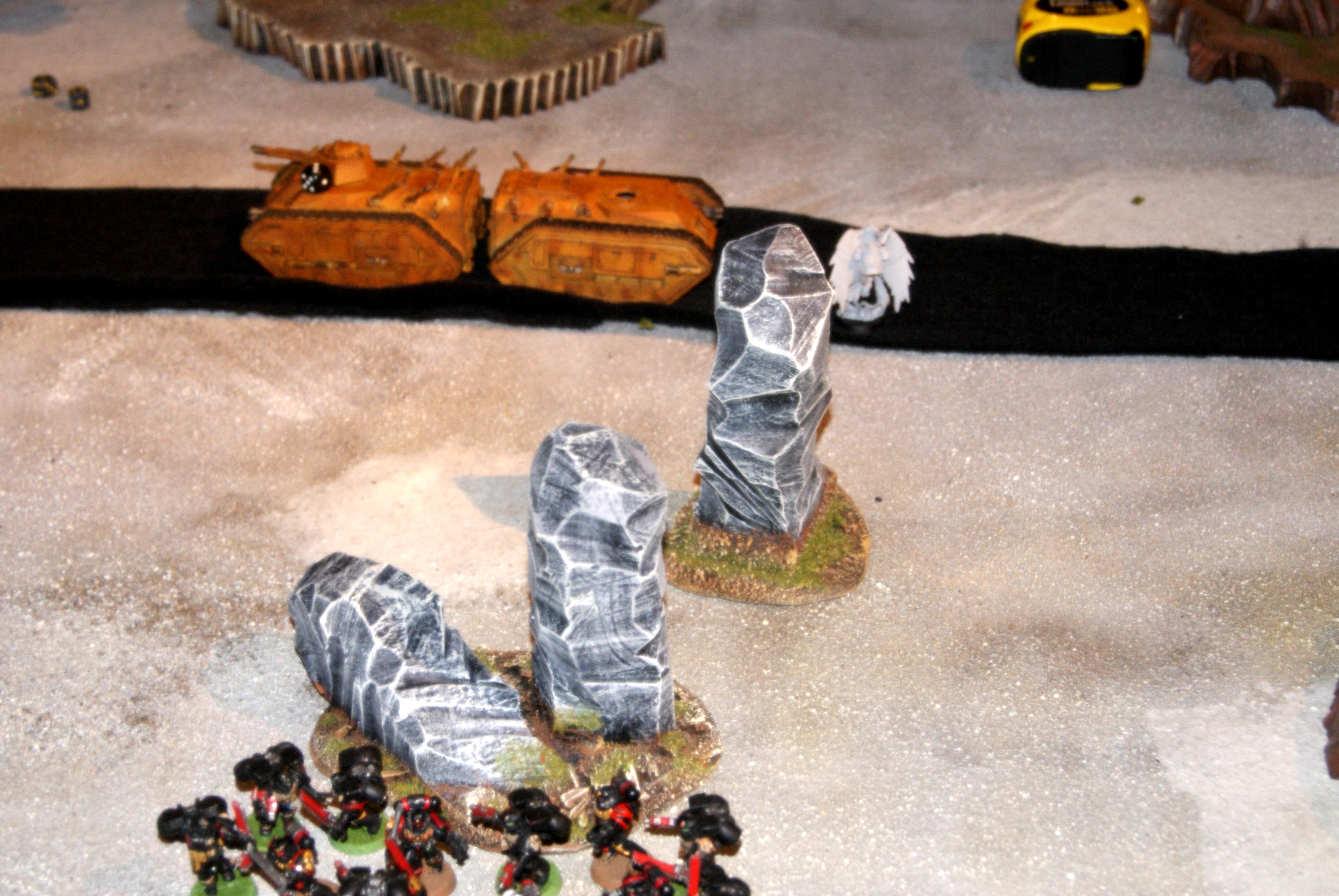 Tanks roll towards the end of the table