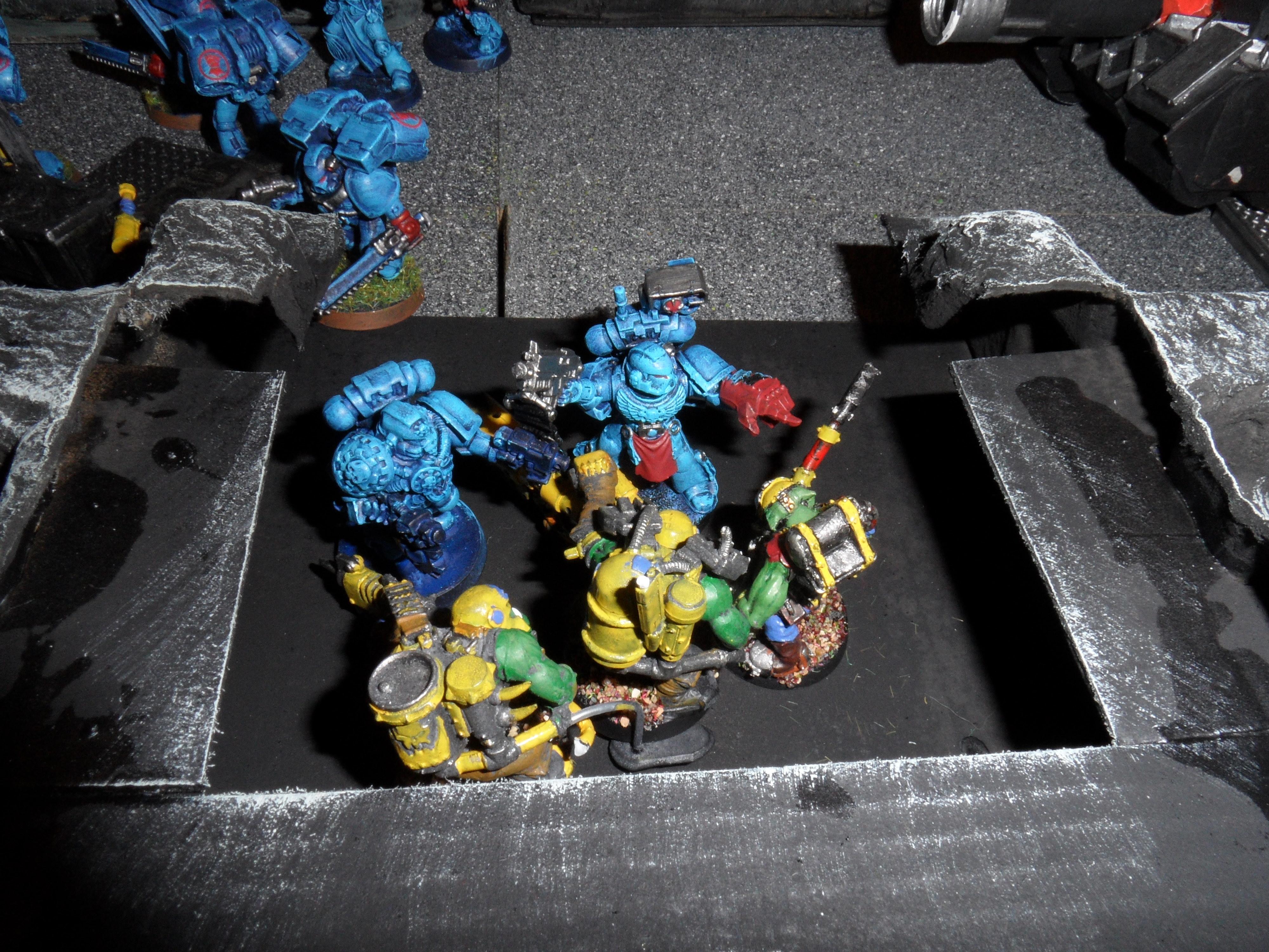 The Devastator Sgt and the Tech Marine wipe out the Burna Boyz
