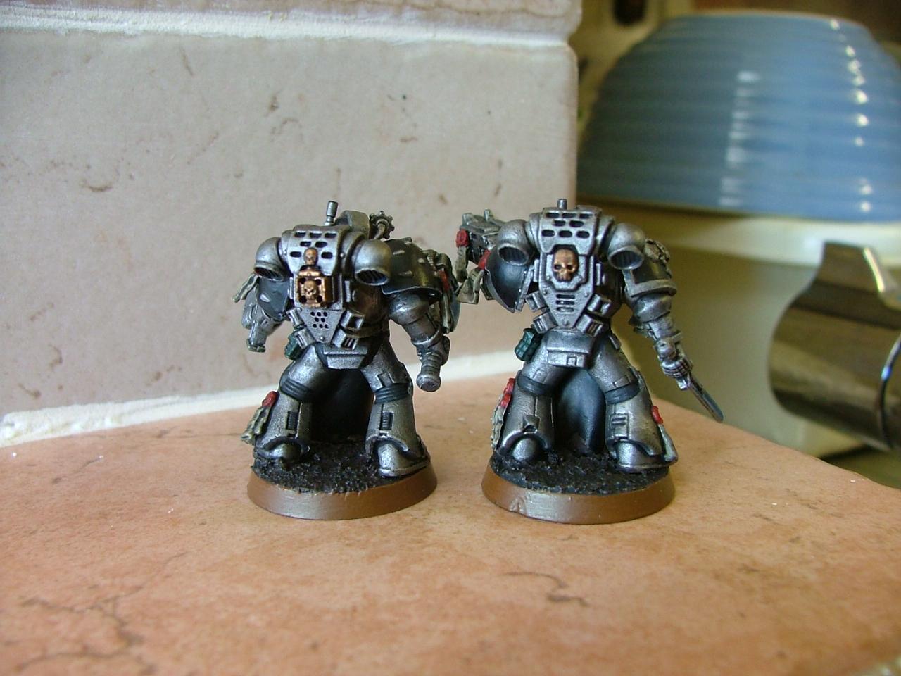 finished silver skulls