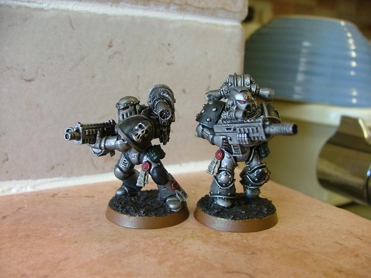 finished silver skulls