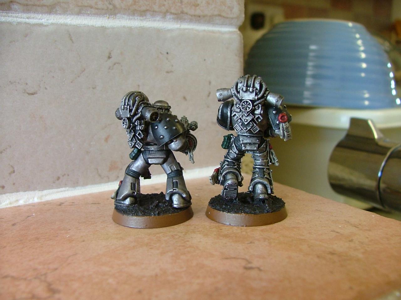 finished silver skulls