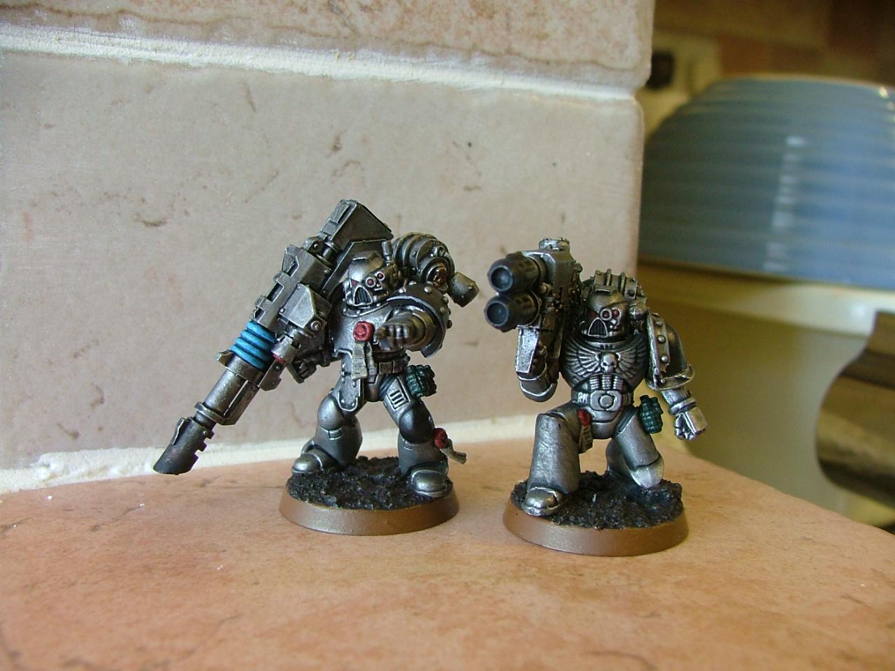 finished silver skulls