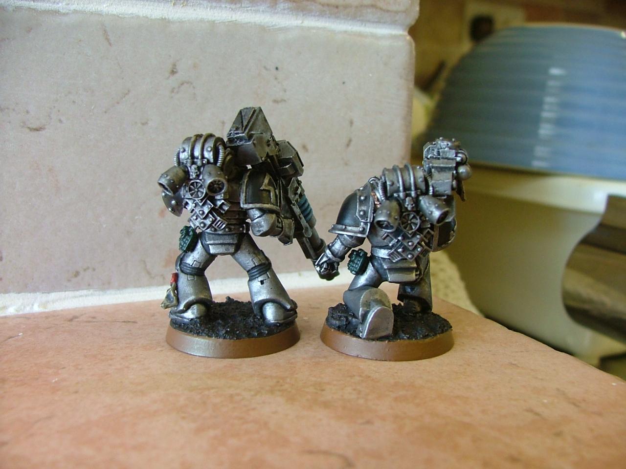 finished silver skulls