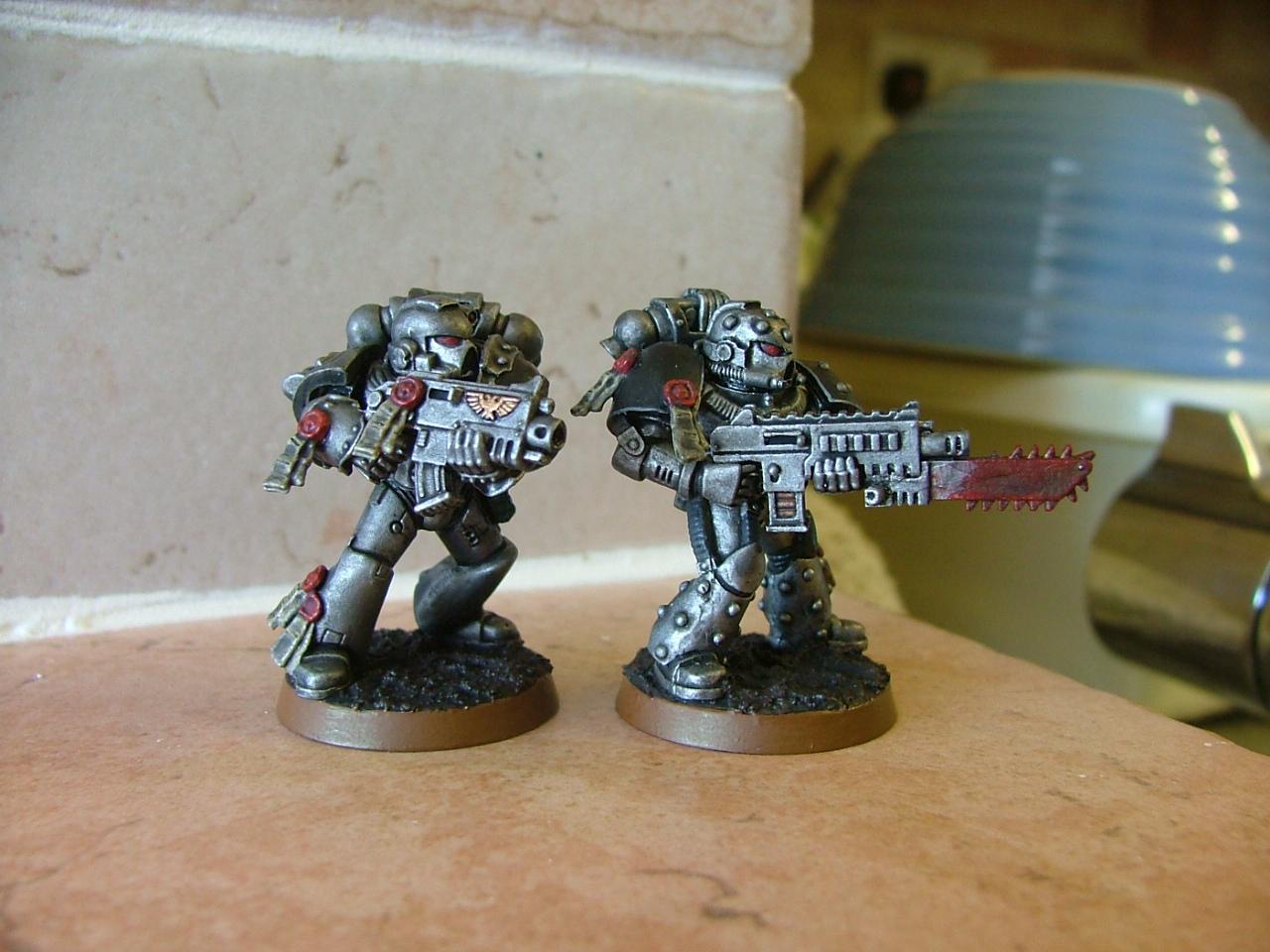 finished silver skulls