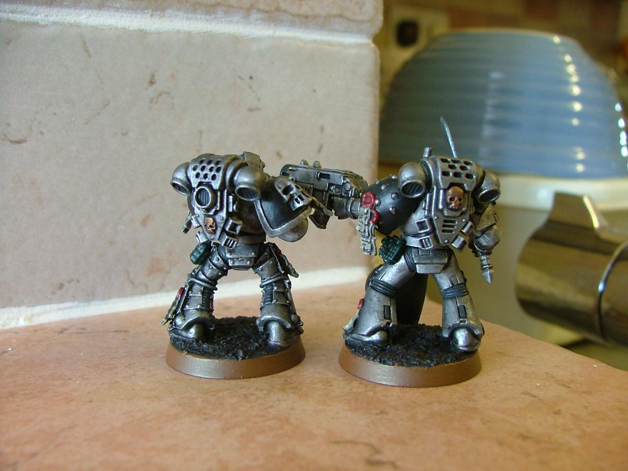 finished silver skulls