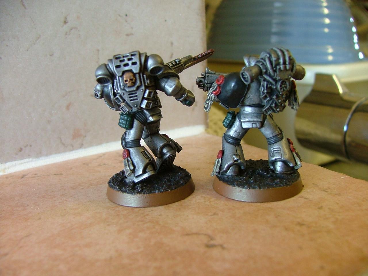 finished silver skulls