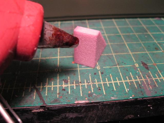 I use a glue gun on low . 