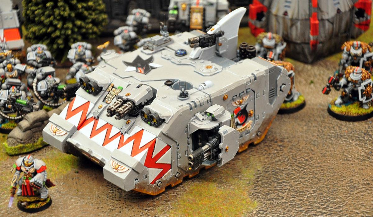 The shark mouth on vehicles/troop helmets is pretty obvious 