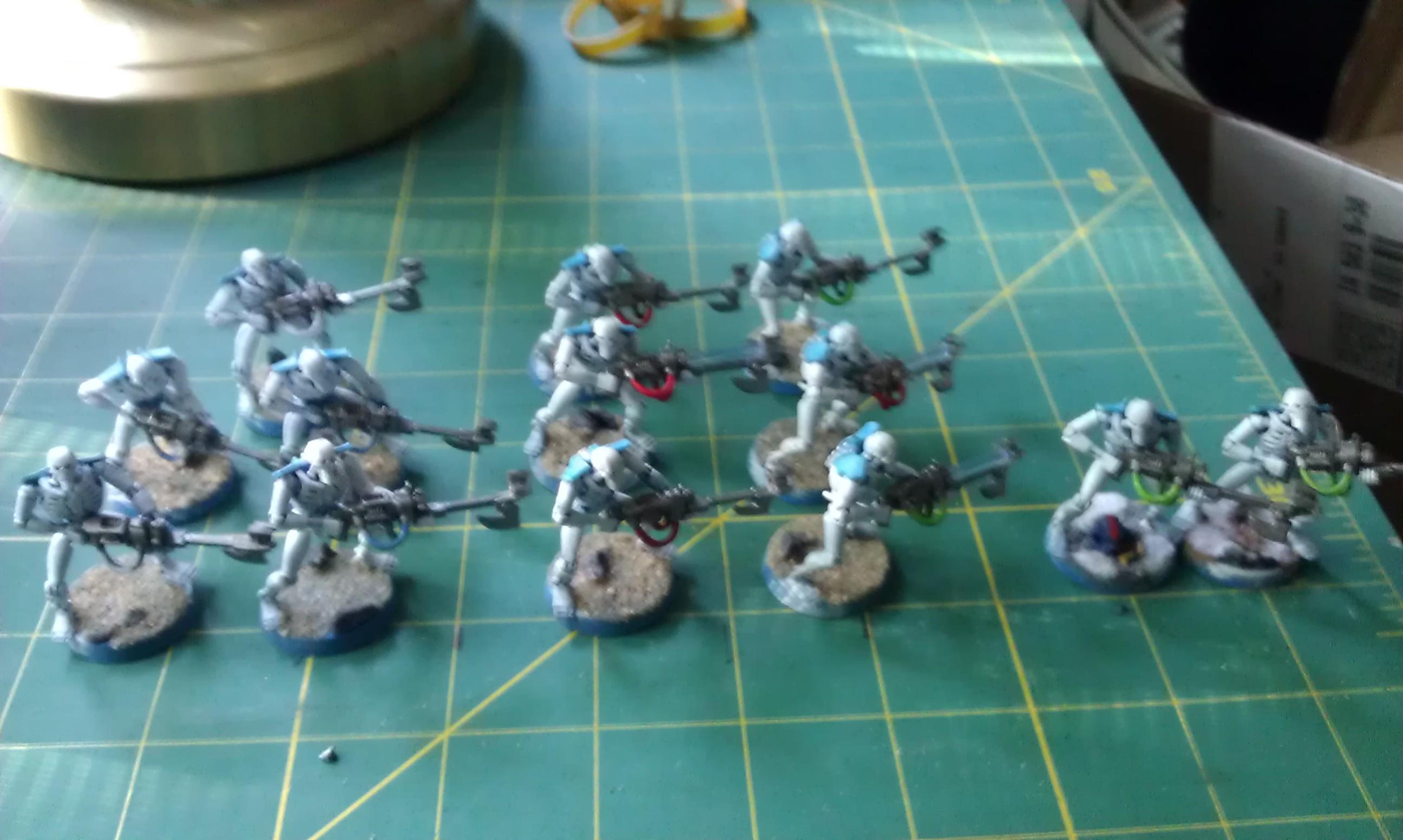 First 13 Necrons awaiting finishing touches to the guns and painted bases