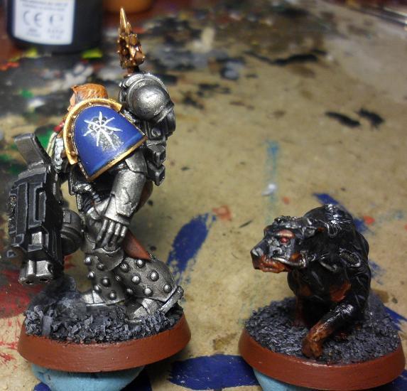 Centurion Michael, Last of the Sane; and CM-634 Cyber Mastiff 'Logan', left