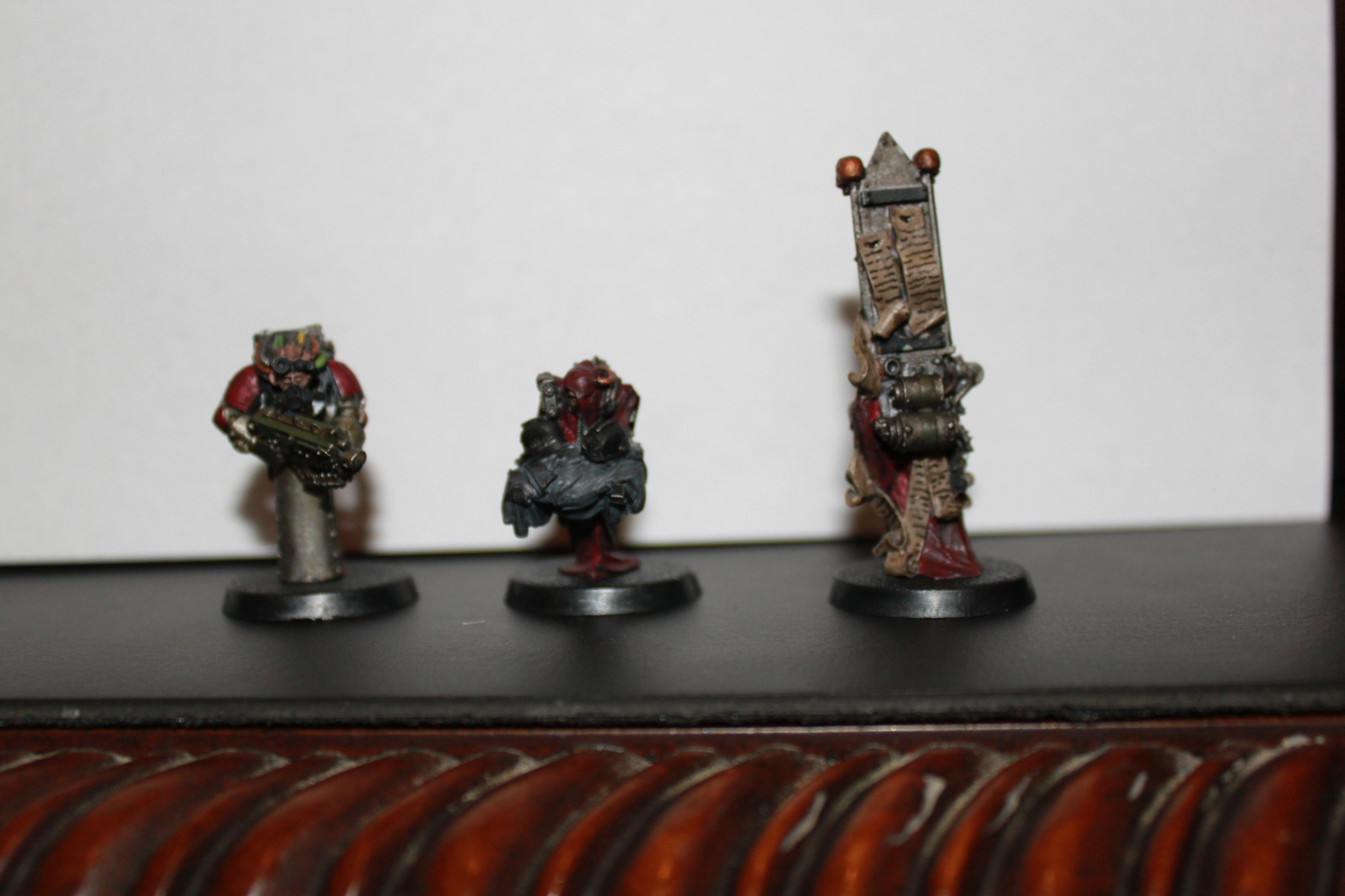 heres the group . the one on the middle is holding clothes from fallen Korpsmen