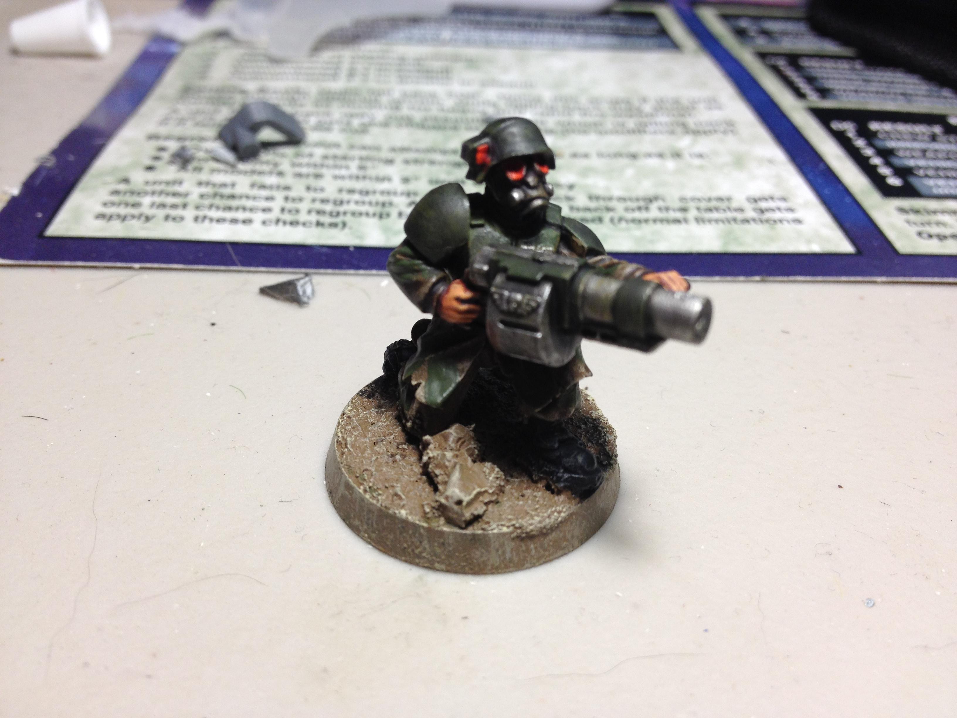 'Nade launcher.  I have since drilled out his barrel, I was just too lazy to take a new pic