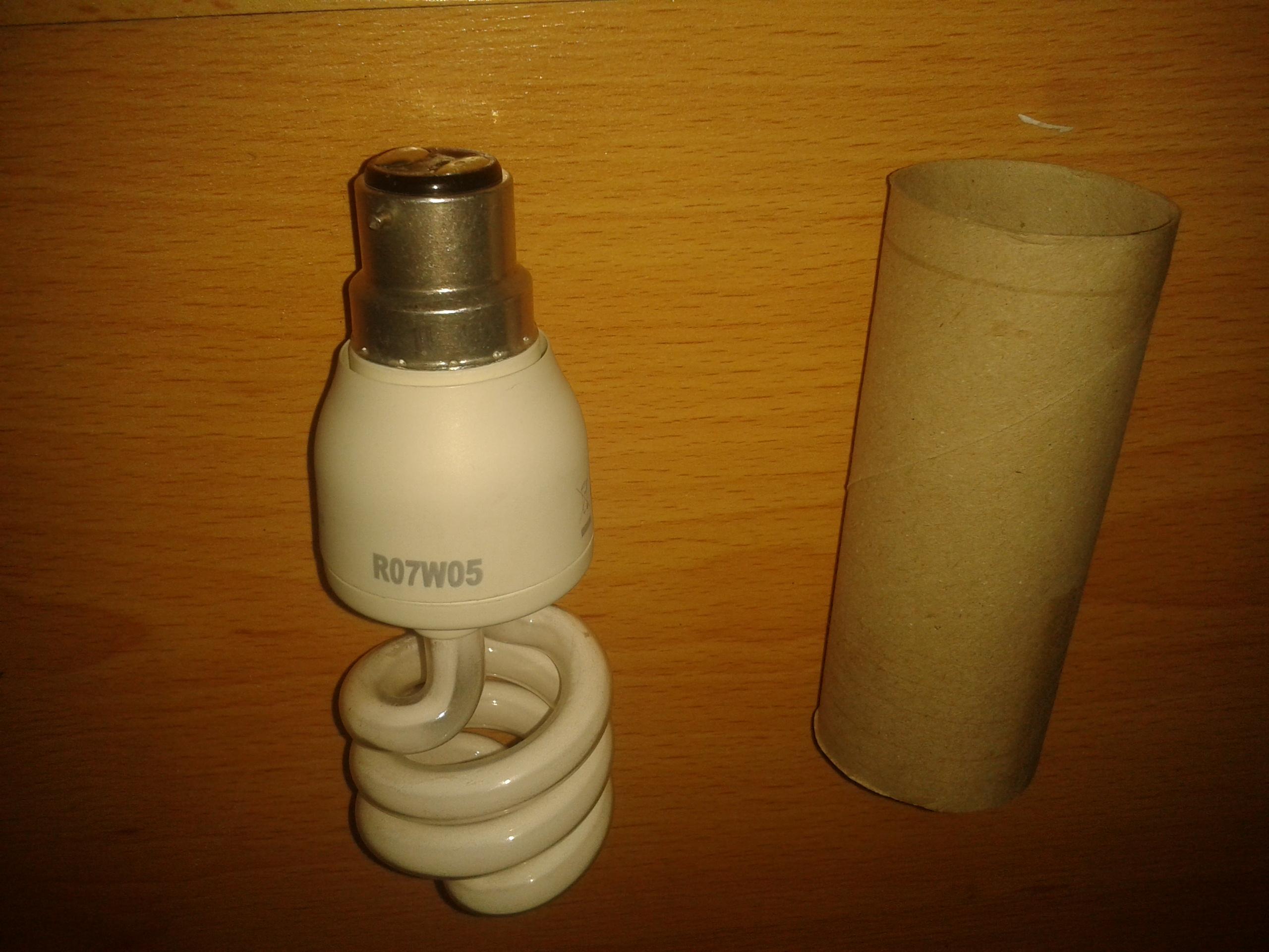 so first i took my burnt out bulb & the carboard bit of some kitchen towel