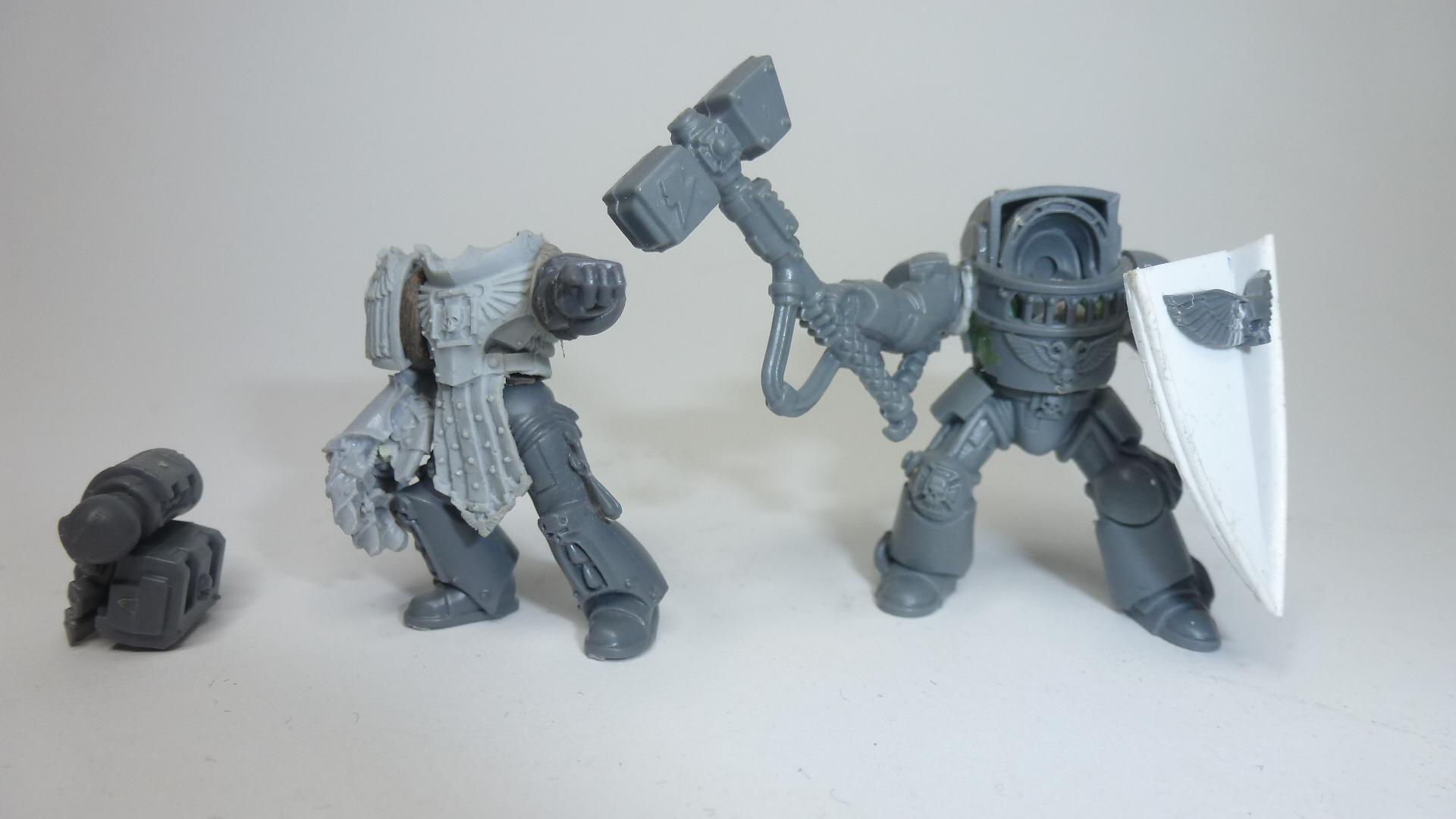 WIP Pedro and Lysander. Lysander's shield is taken from Scars emperors Children. If you havnt seen his blog here's the link http://www.dakkadakka.com/dakkaforum/posts/list/487760.page  