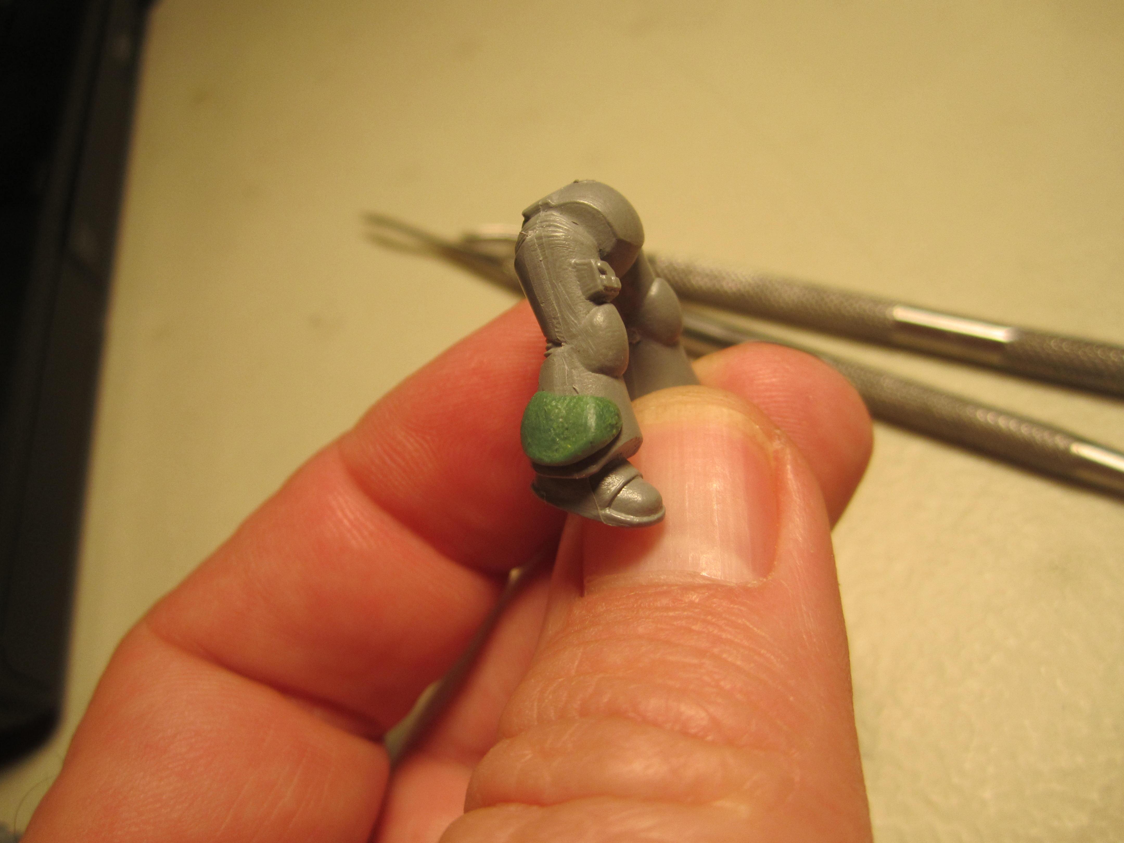 apply a small amount of putty in the general area to be sculpted. 