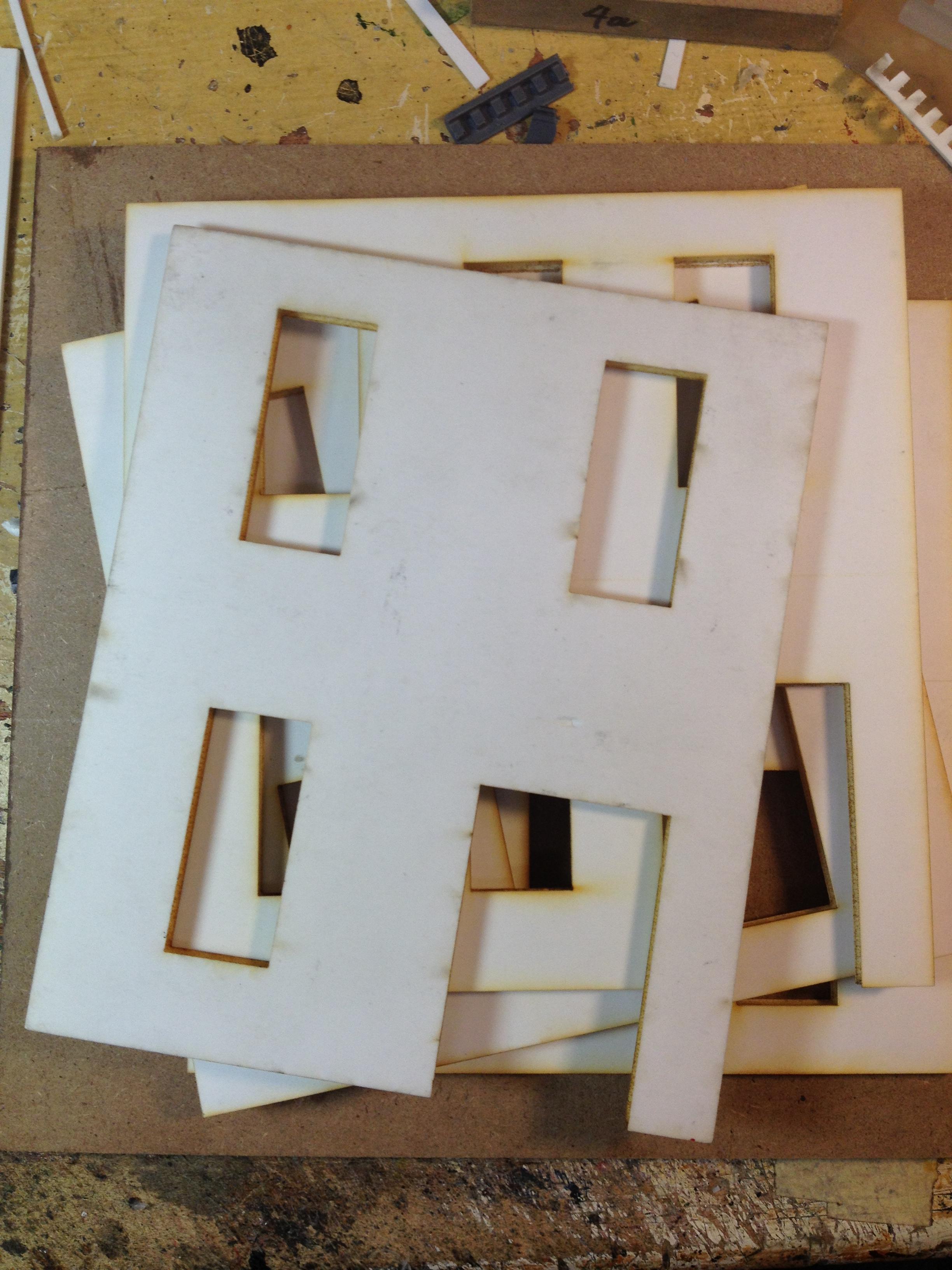 Rough pile of Laser Cut Gator Board