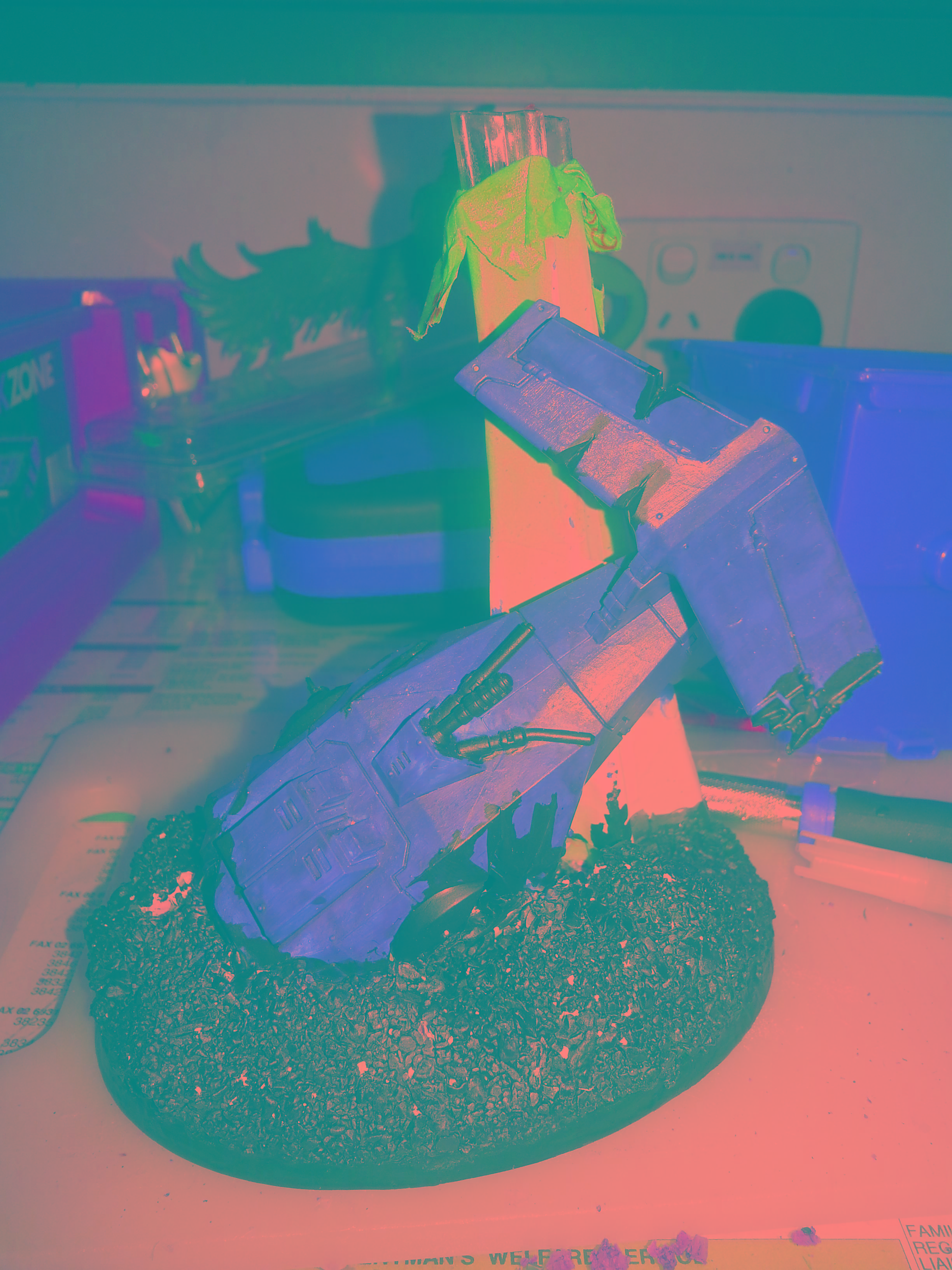 the base is a crashed storm talon in the rocks that match the rest of my army