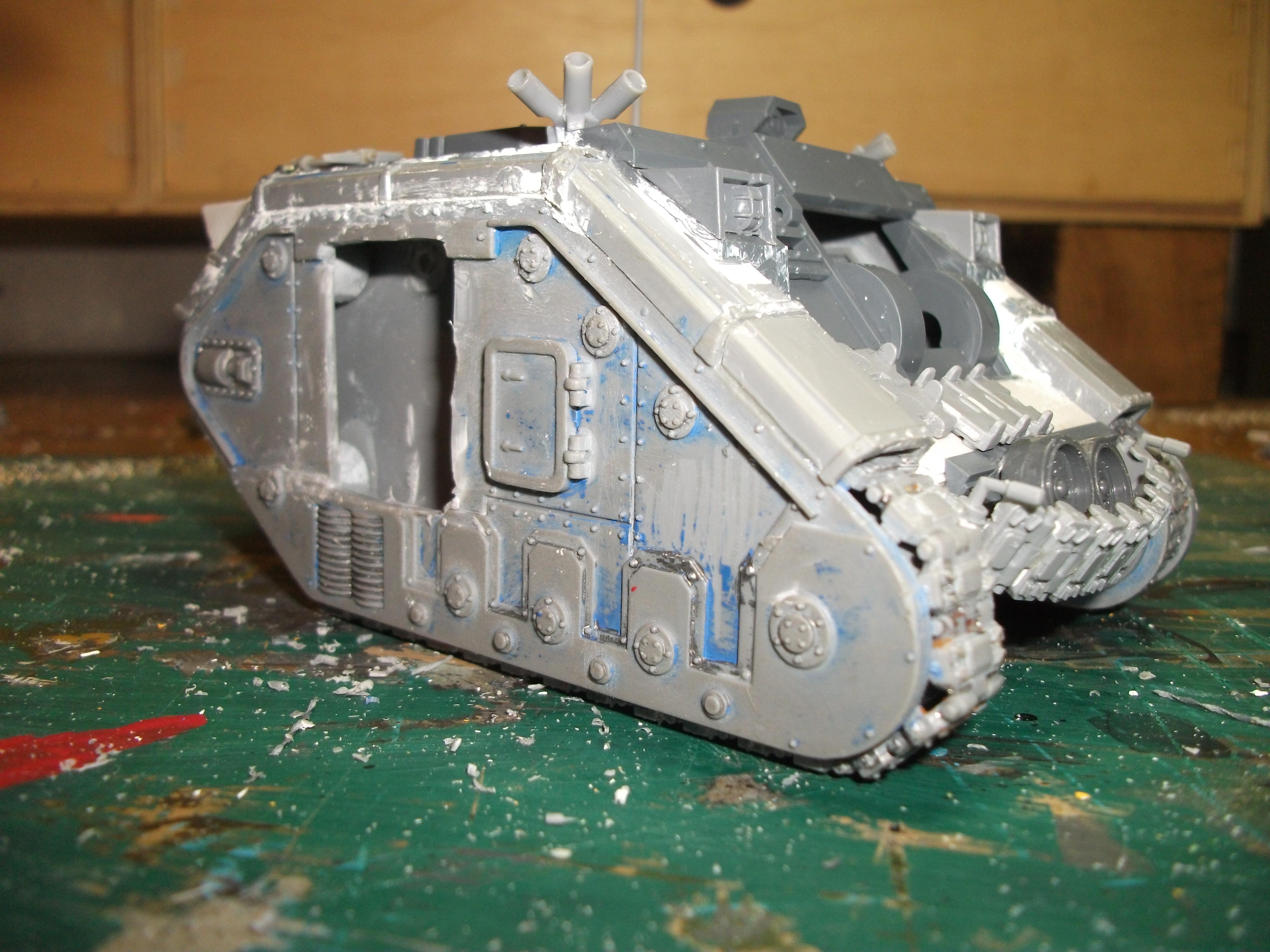 The vindicator front is roughly similar width to the Leman body but some superstructure need to be built with plasticard , I filled gaps with Miliput. 