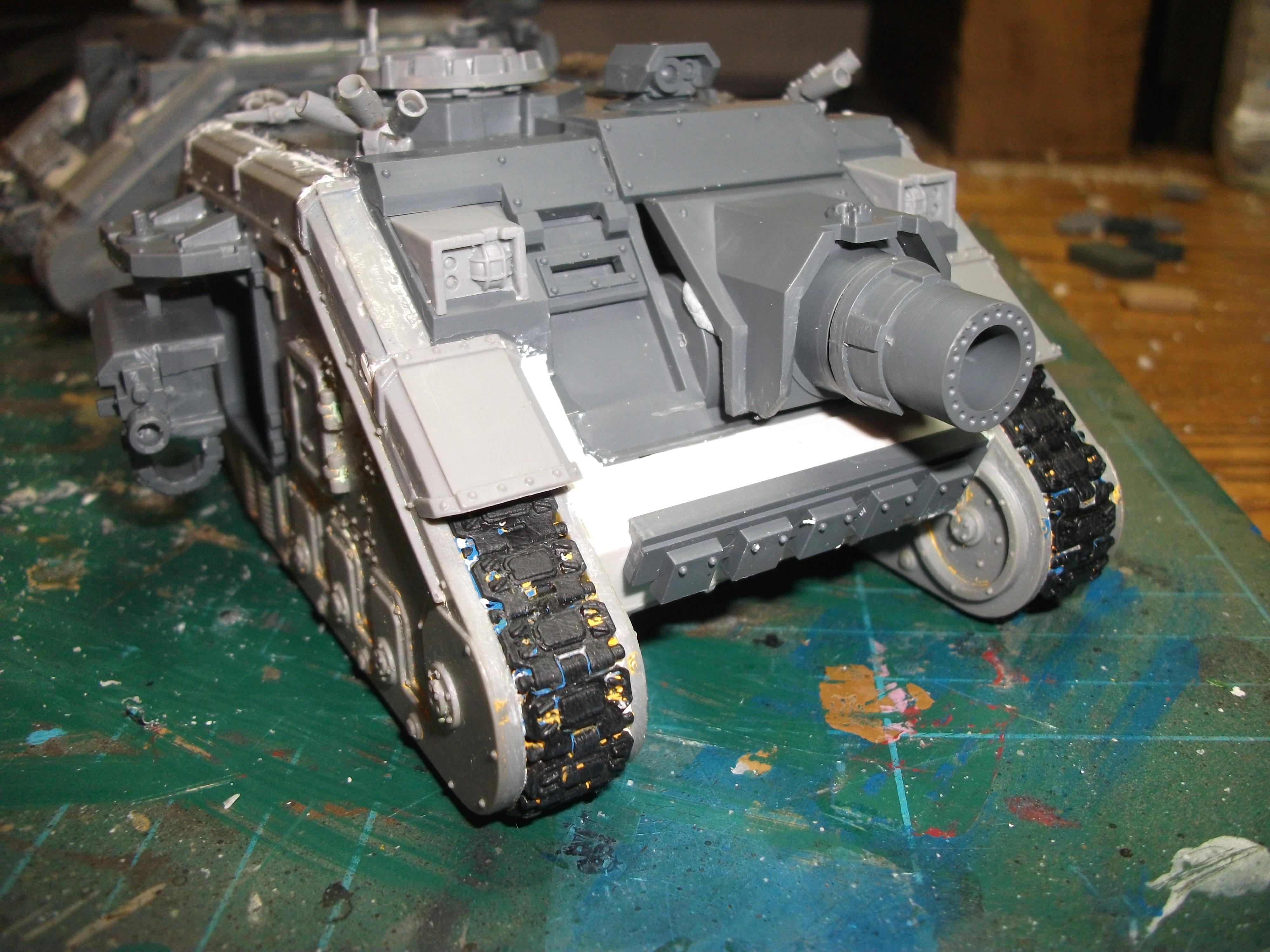 Vindicator main gun . The longer barrel is a snug fit and slides in and out as necessary , might magnetise this part so I can fit a gatling gun type weapon. 