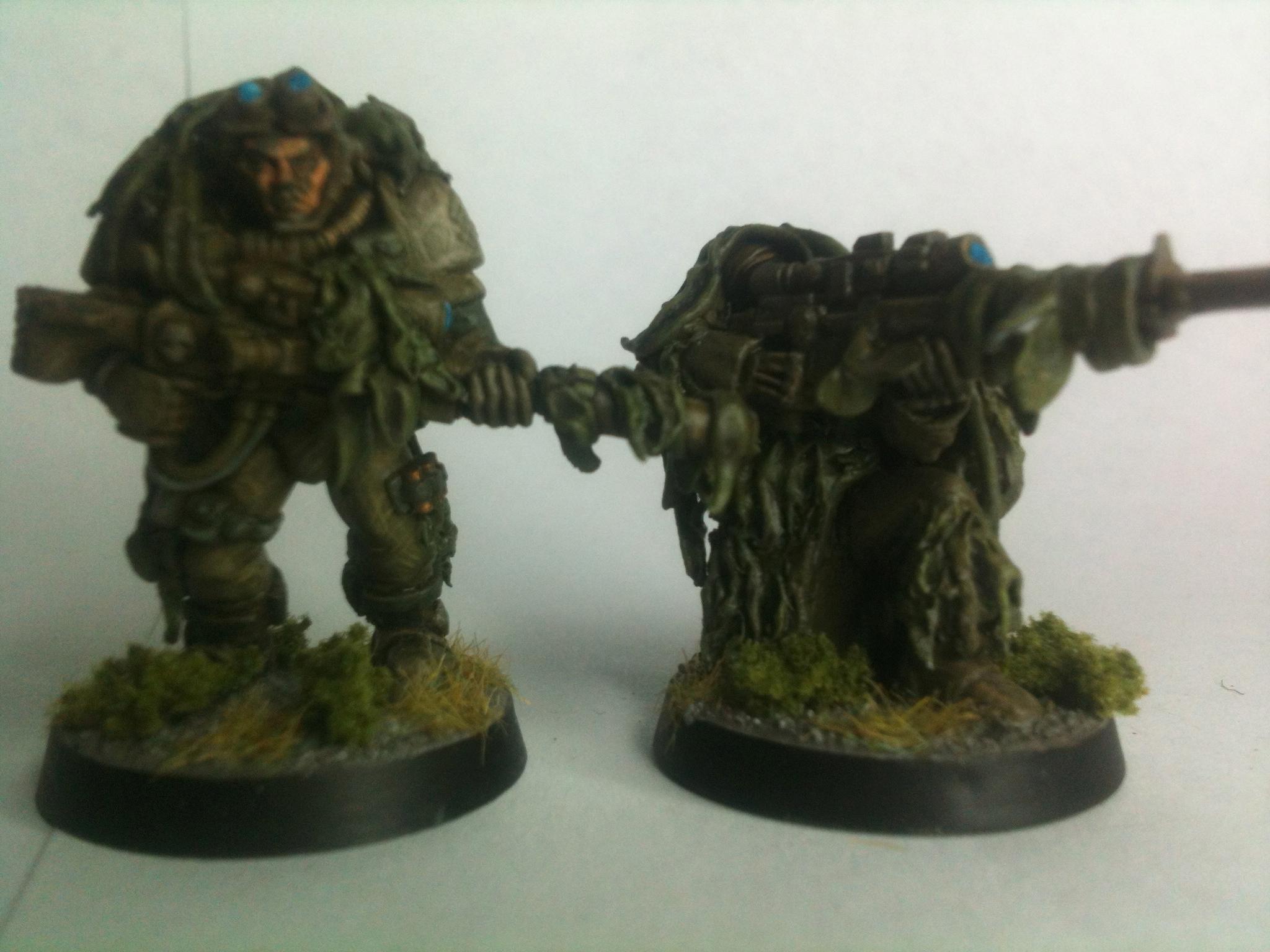 Sniper pair. Kneeling sniper is based on a High Elf Archer and ALOT of greenstuff