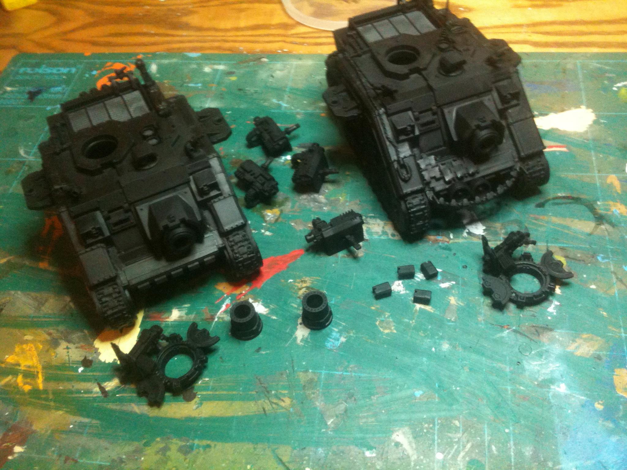 I prime them lightly black first , paying most attention to the tracks / lower surfaces