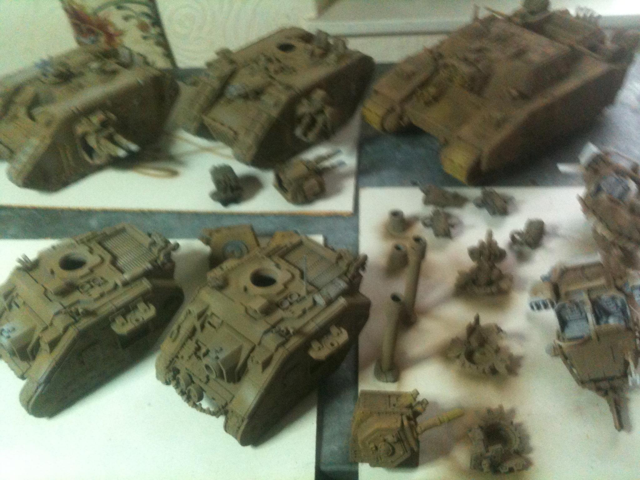 Started with a dark earth brown loosely sprayed into crevises , deep shade area to provide some depth