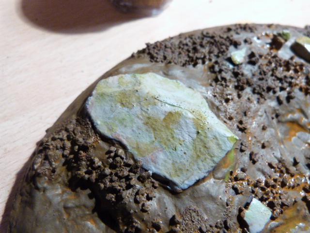 Started adding thin colours on the rocks for texture, greens, browns and some black