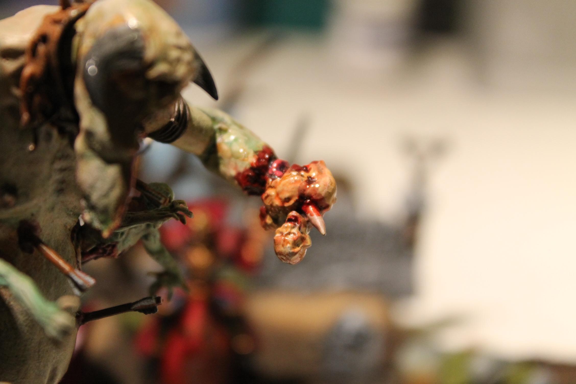 The creatures hand has rotted away but it can still use it's exposed wrist bone to impale victims