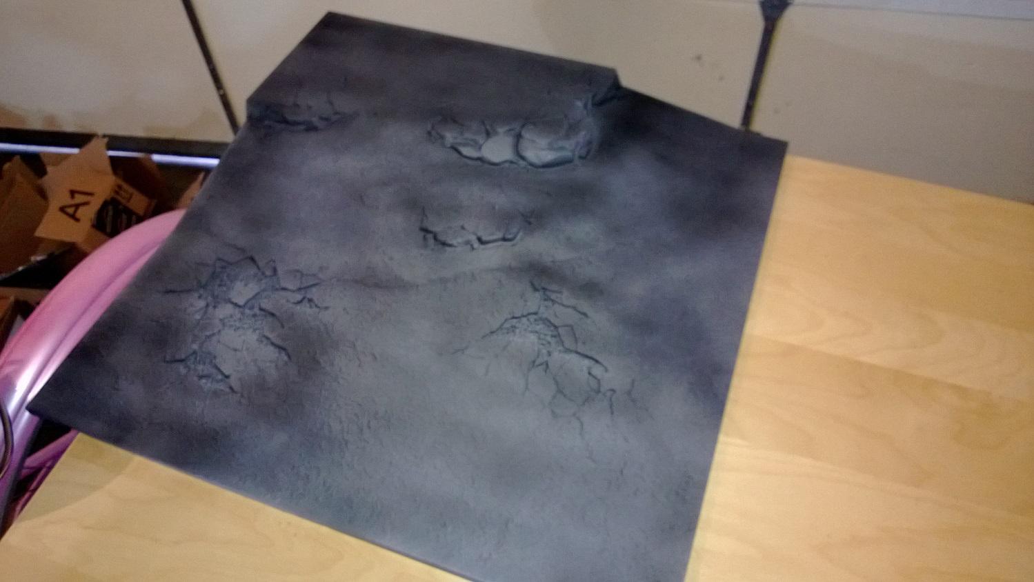 A few layers of black primer over the original white/grey