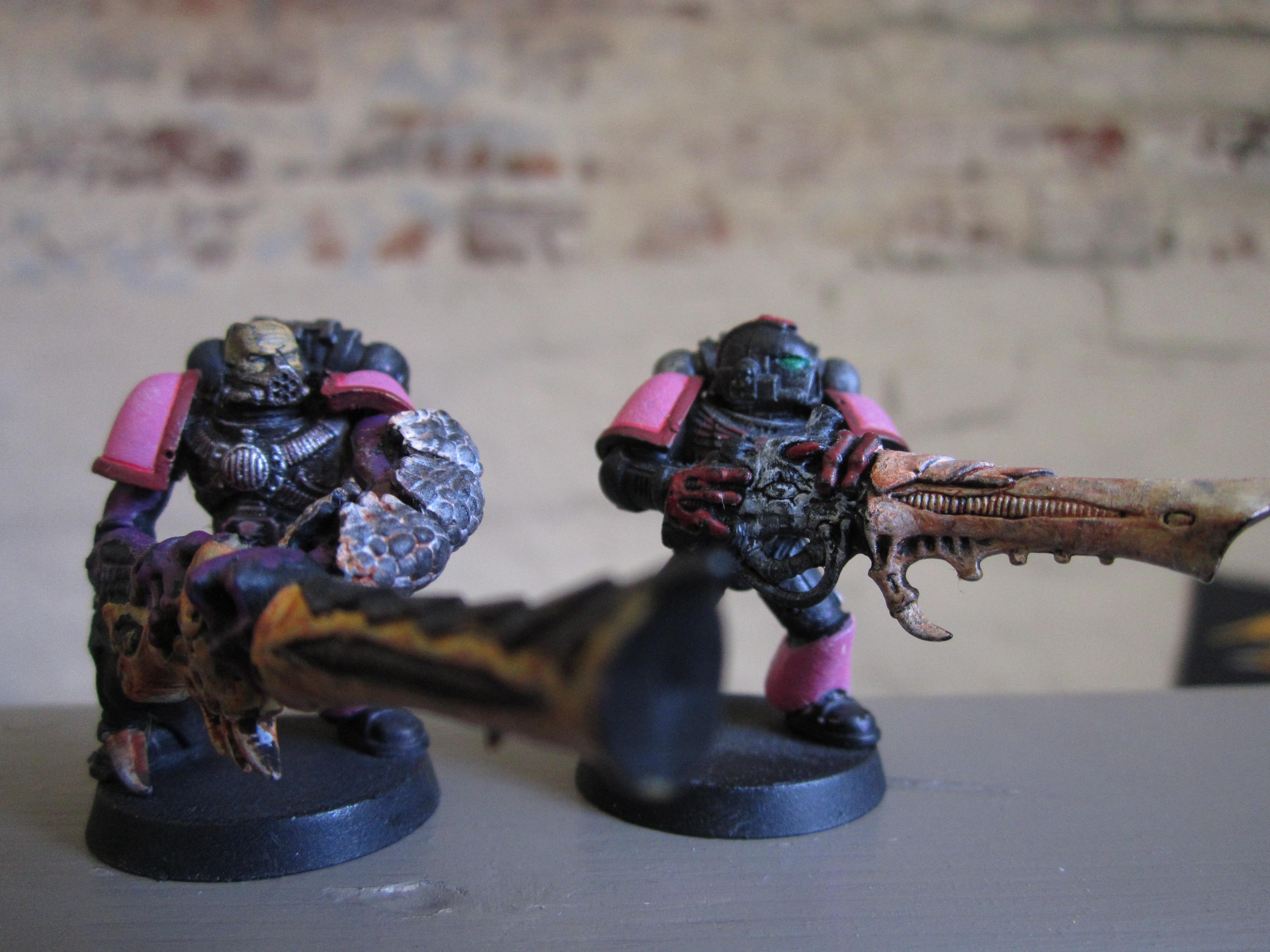 Pink Chaos Marines with dakka mutations!