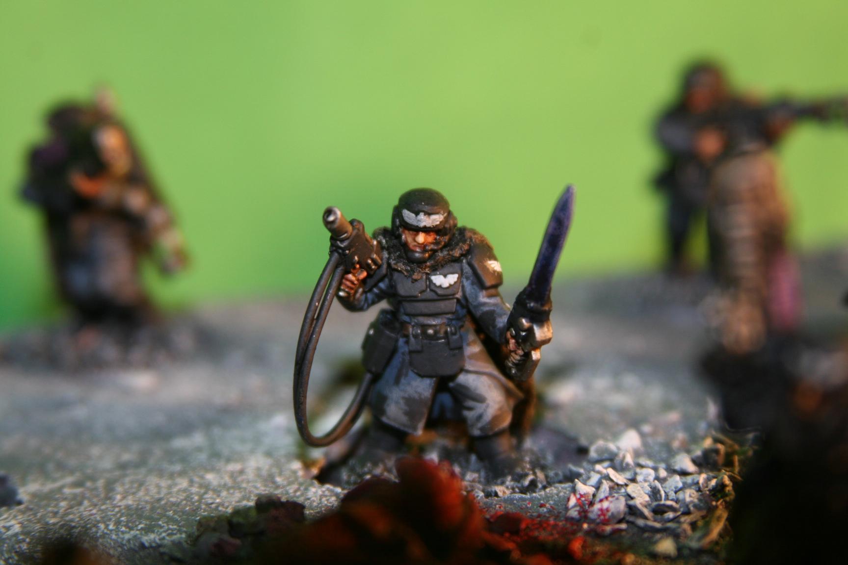 Cadians, Sgt. Mueller glancing down at the dead soldier