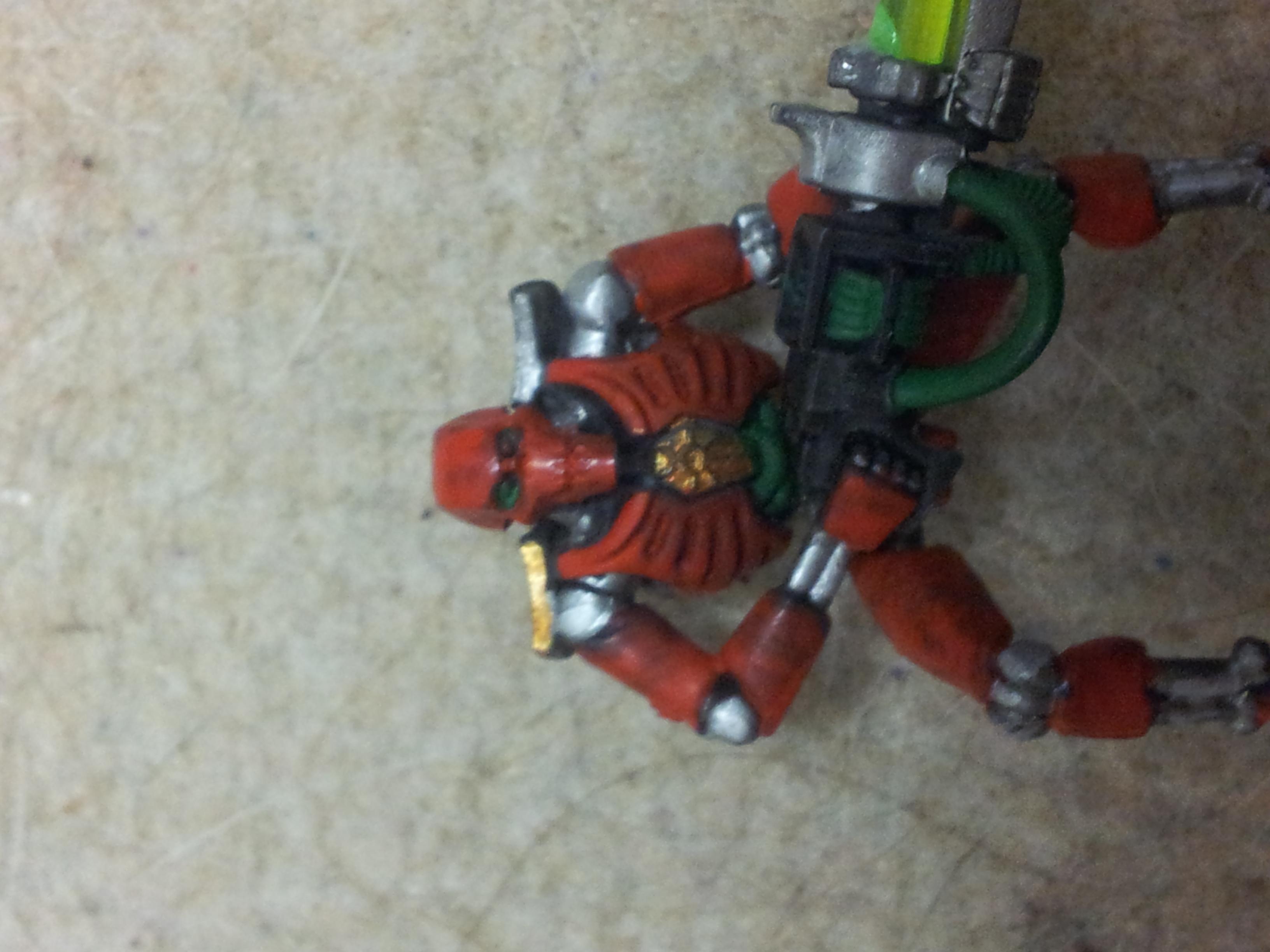 mephiston red basecoat, ironbreaker joints, shining gold right shoulder (squad marking), skull white/caliban green weapon wires/eyes