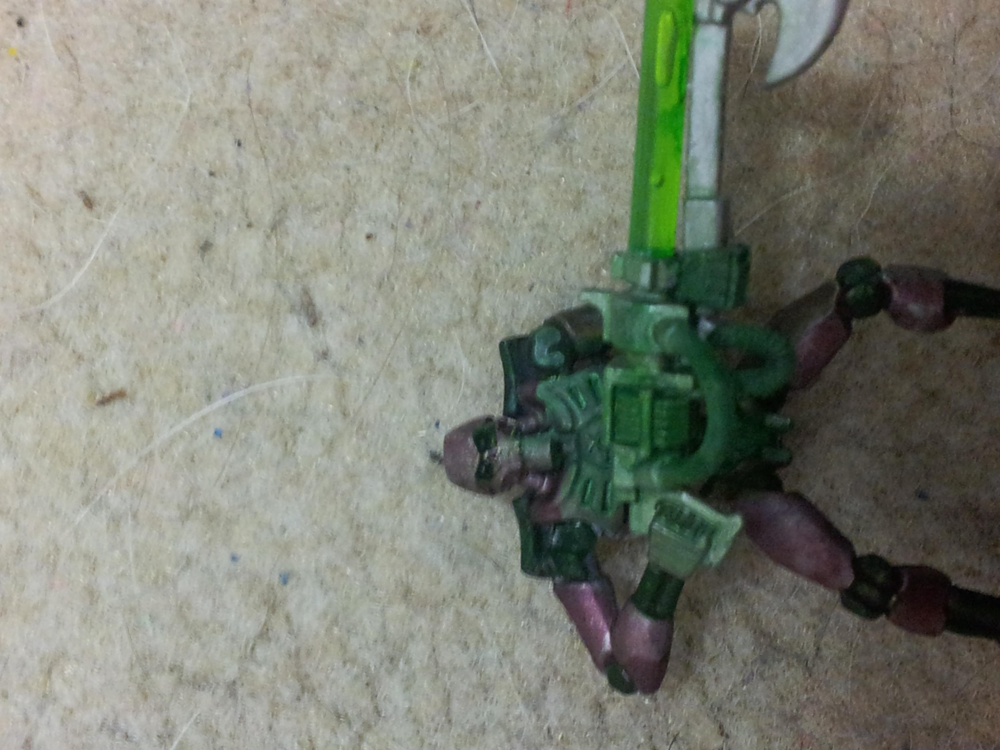 ironbreaker basecoat, carroburg crimson wash, caliban green joints, and skull white/caliban green weapon glow effects