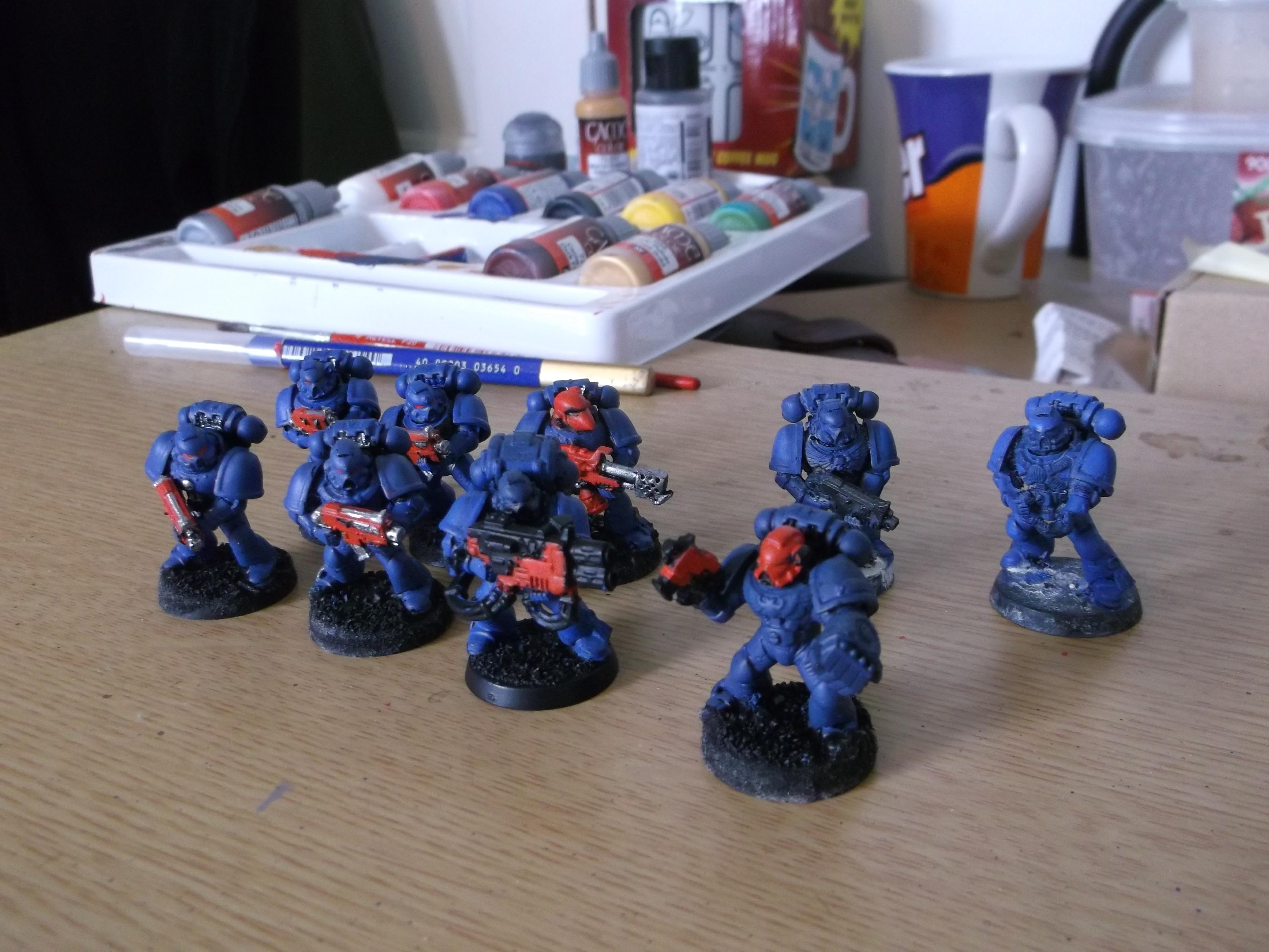 The Tactical Marines. Had ten, but lost one to the underworld of my desk (Emperor preserve him). I tried red bolters first just to see what they'd look like, but i think I'll go with the black colour thats in at the moment
