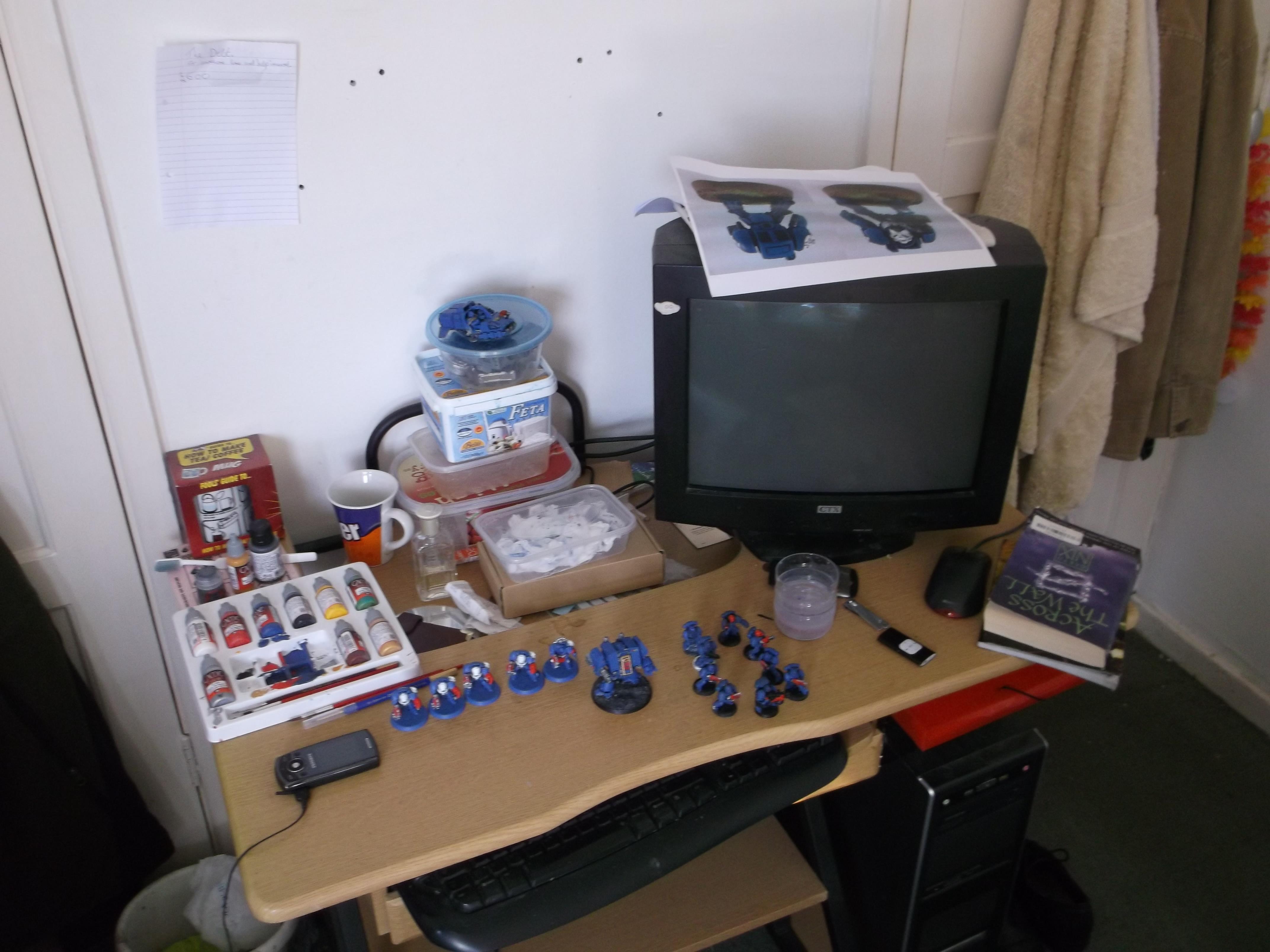 My current workspace. Upgrading with a lamp to paint better at night. 