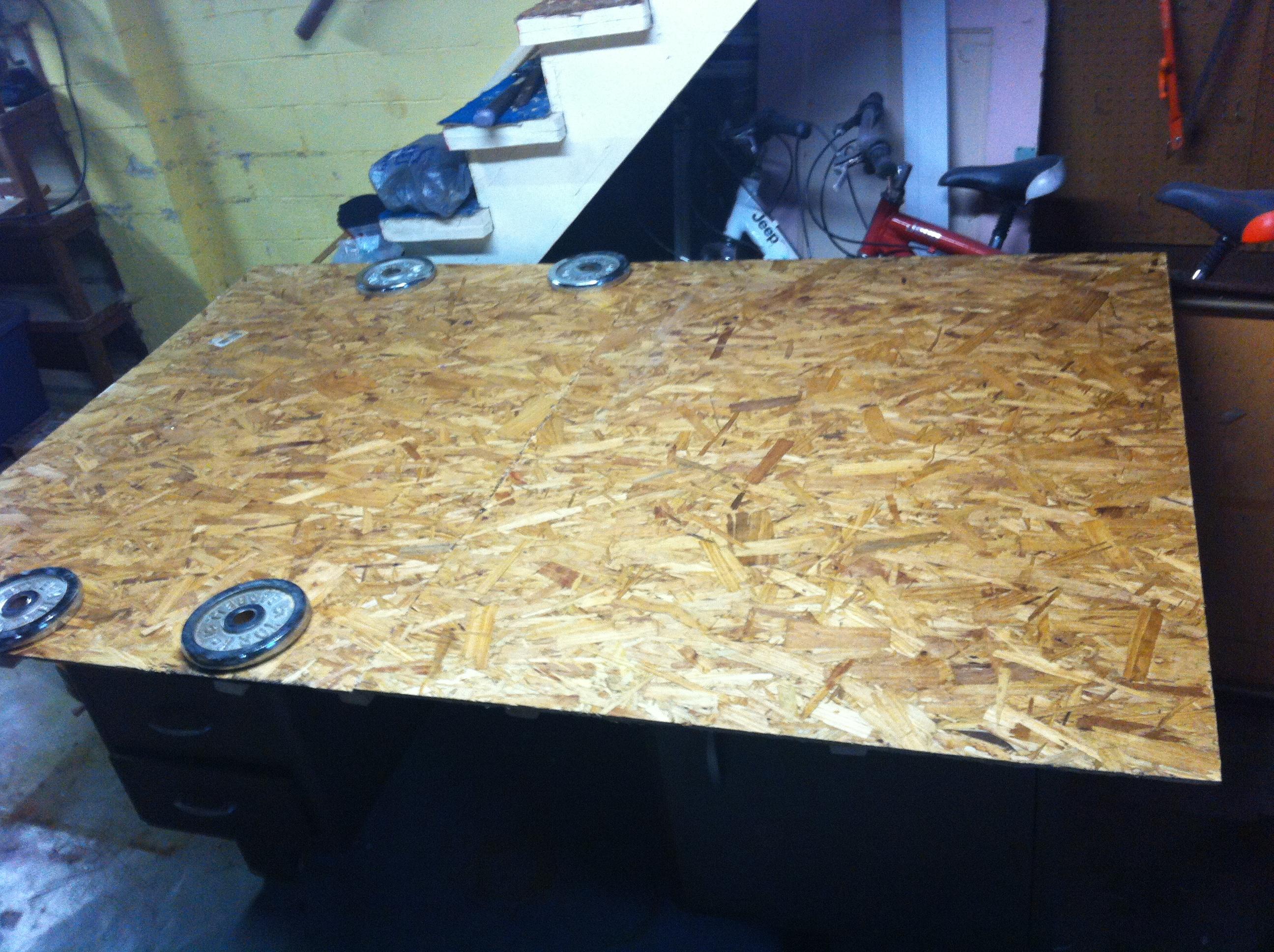 Two 3x4 sections glued down right over top of the beams. about $13