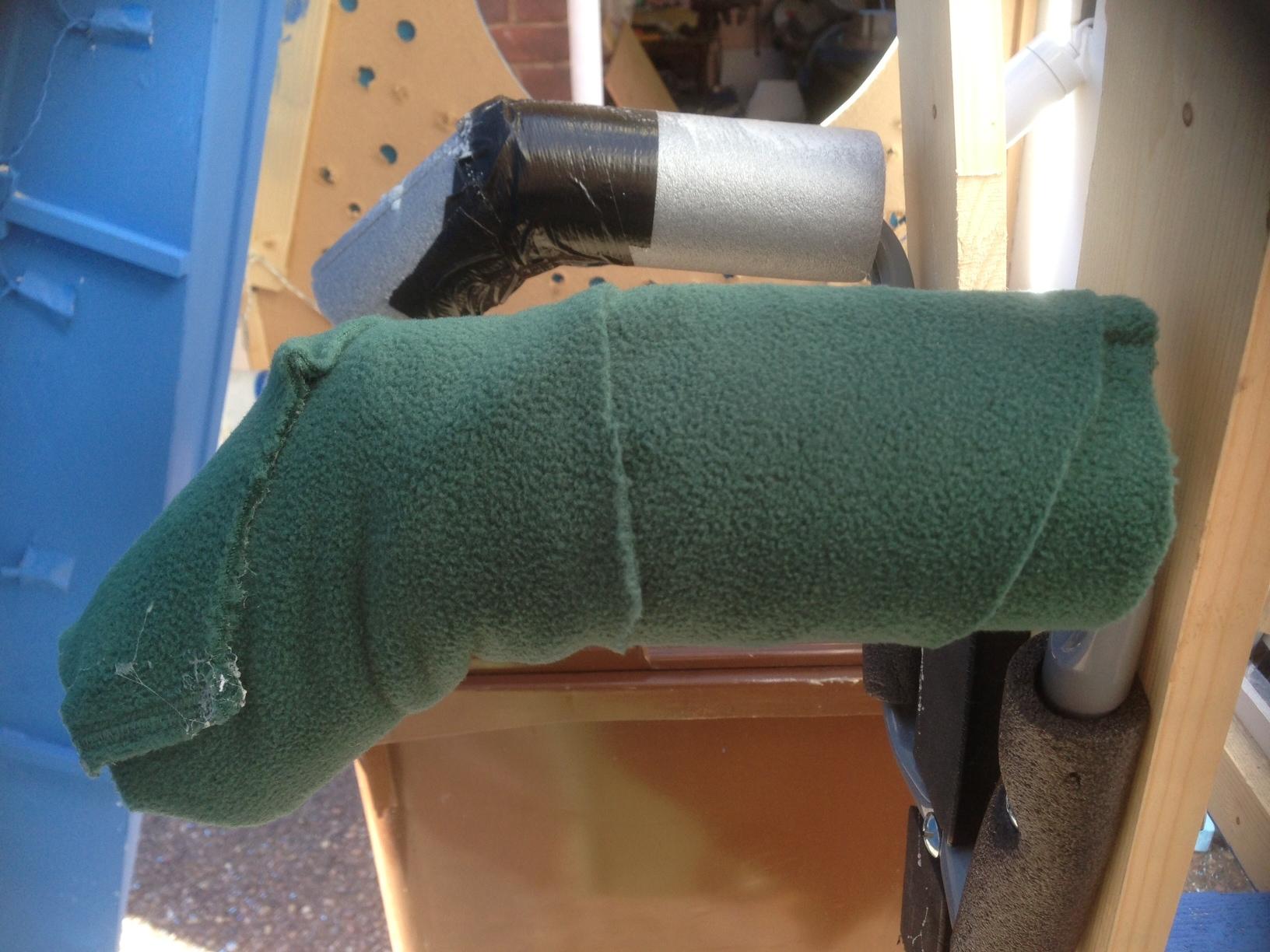 Duck taped the foam to the metal frame and added the fleece
