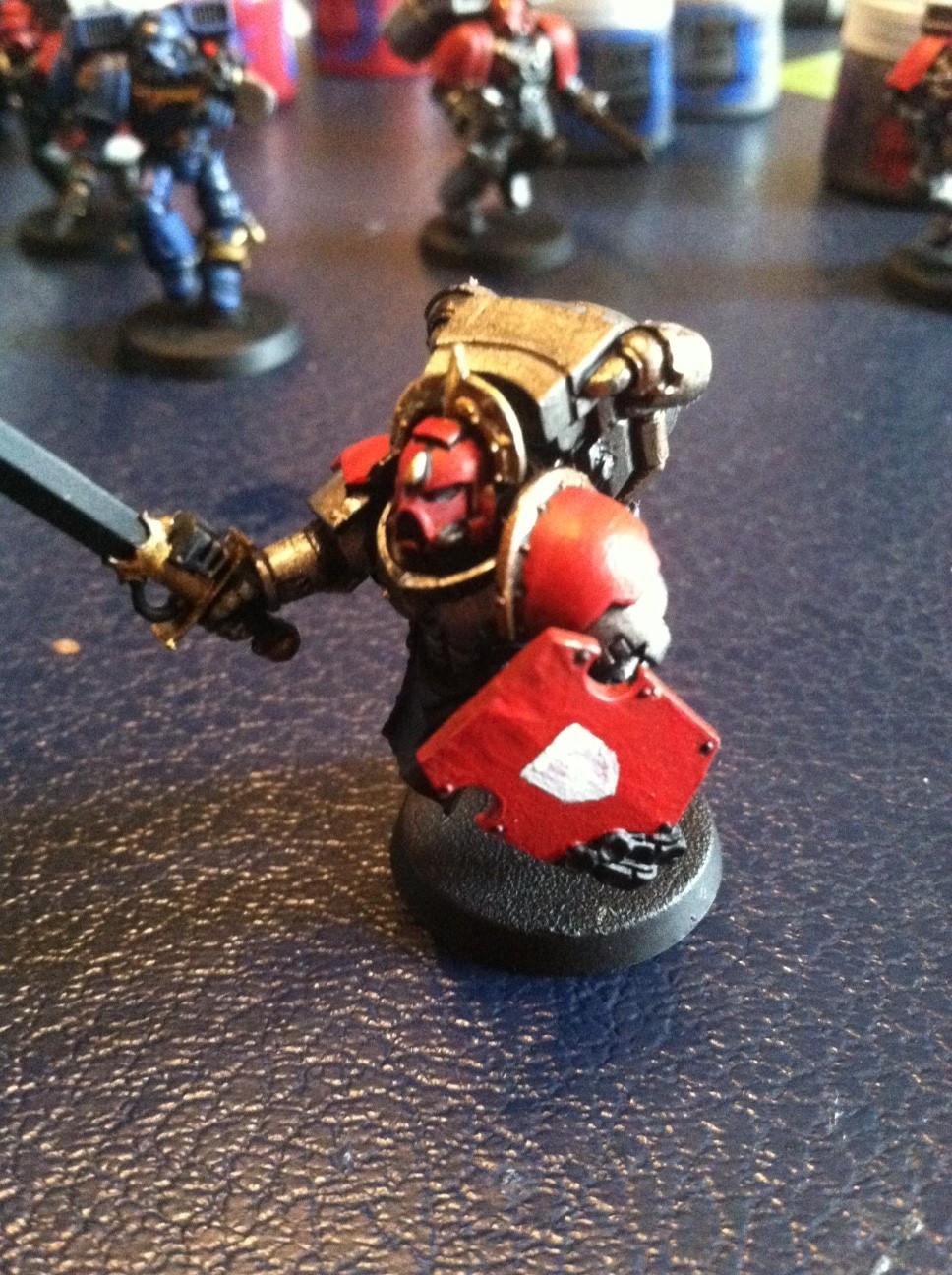 Sgt with the outline of the badge on the combat shield