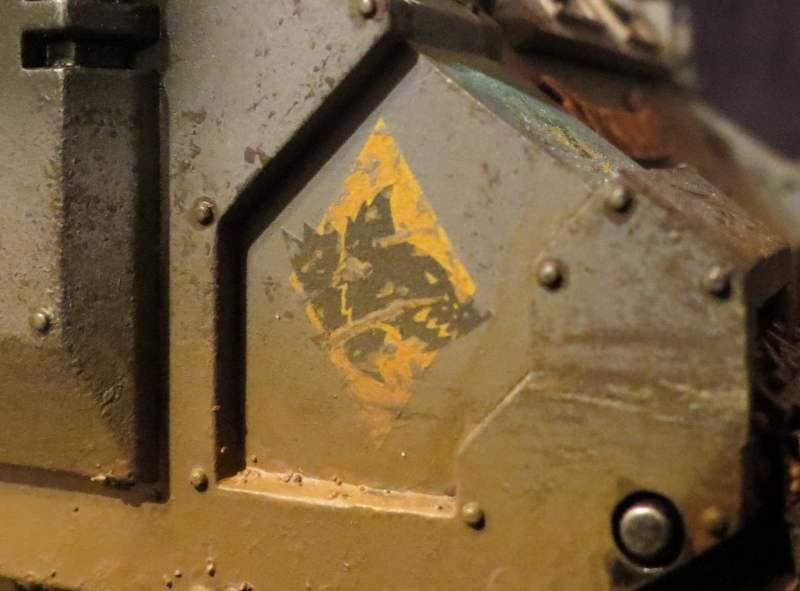 Close up of weathered and damaged insignia