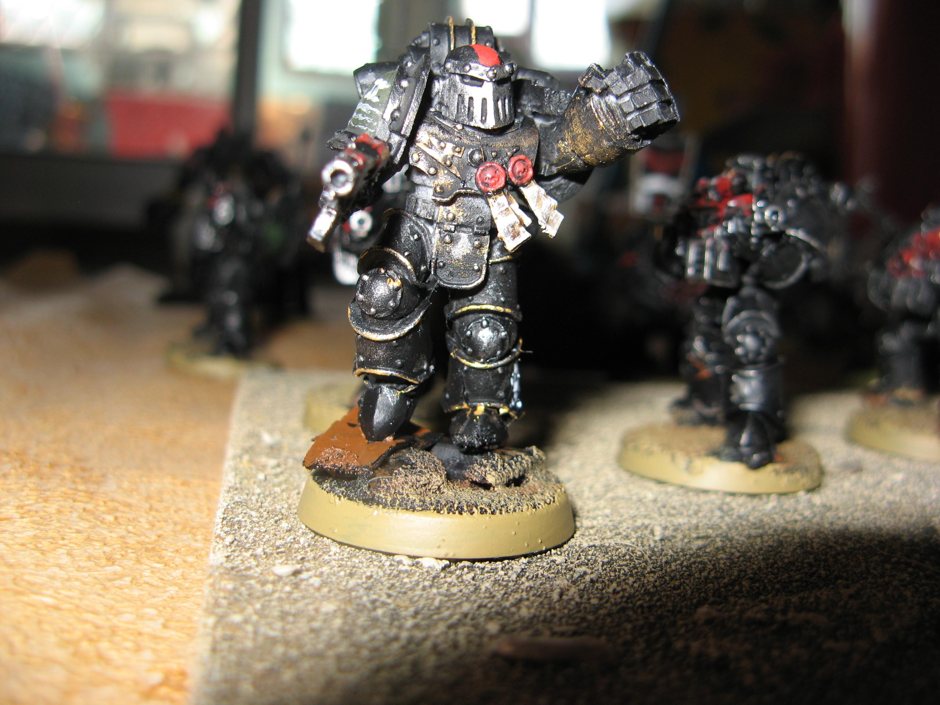 vet sarge Azrubael leads a counter attack, autocannon shells from the contemptor cracking over his head