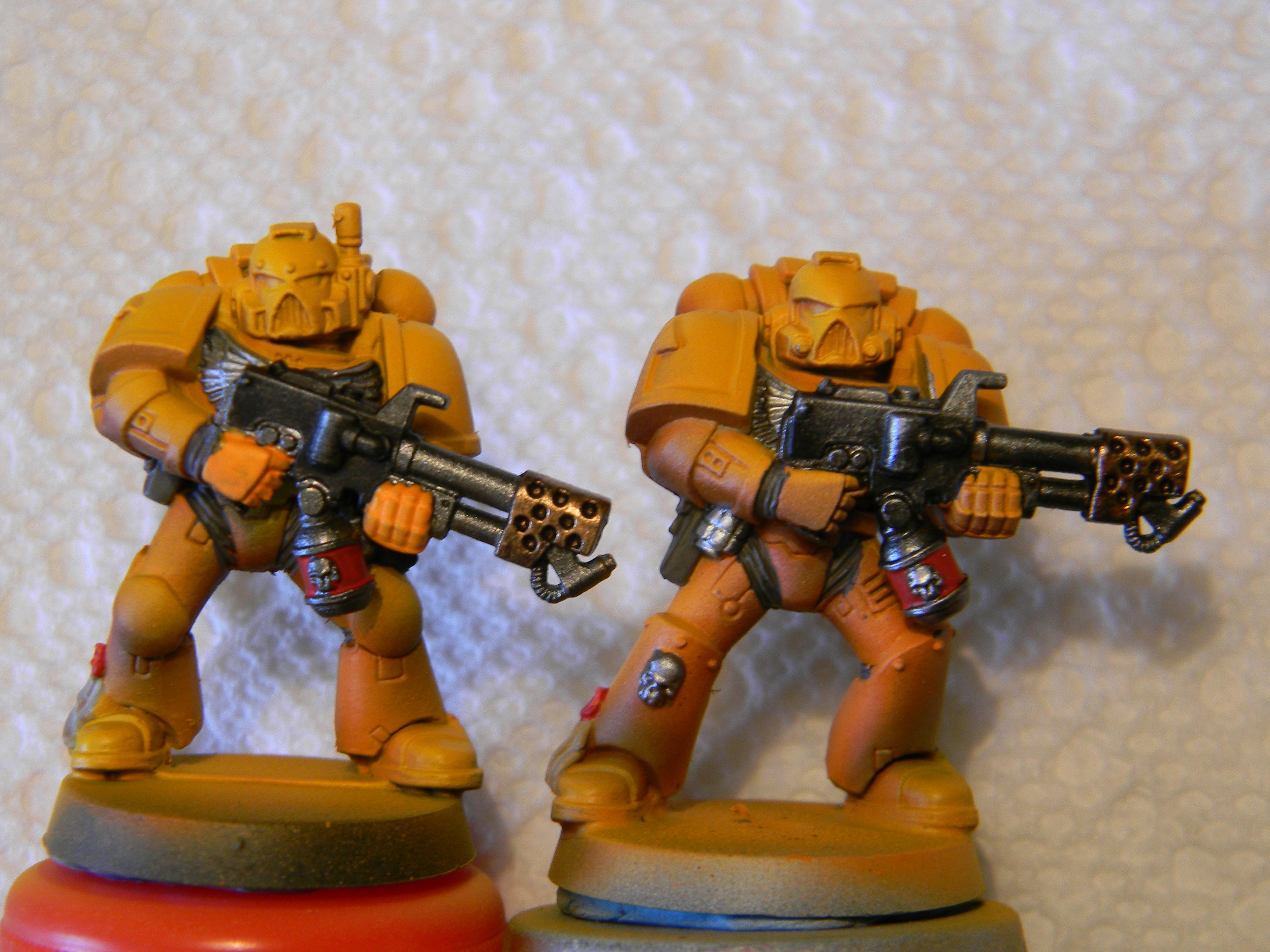 Left model was painted with flamer off the right one painted as one piece