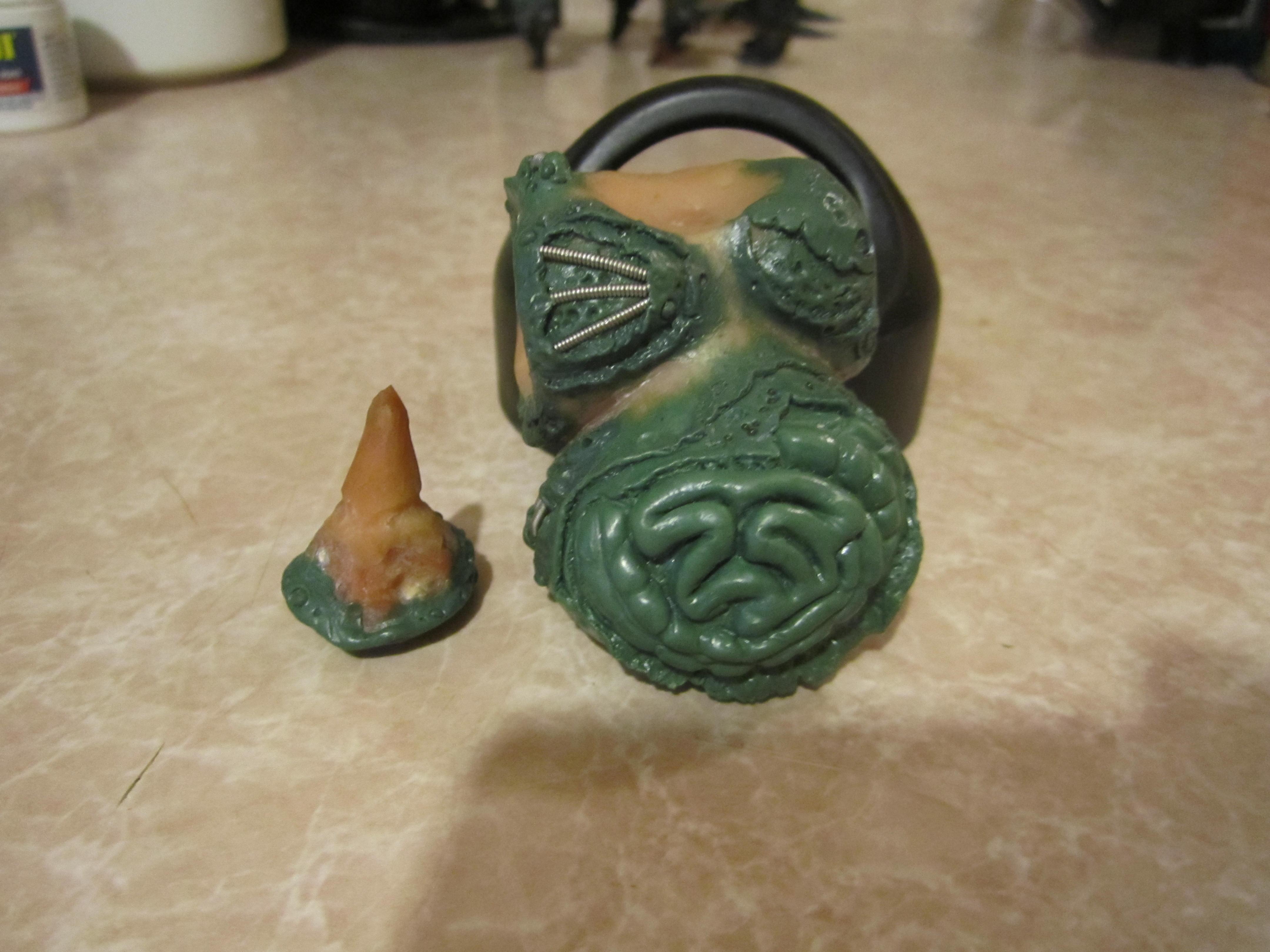 Shown with head removed.  Swappable heads