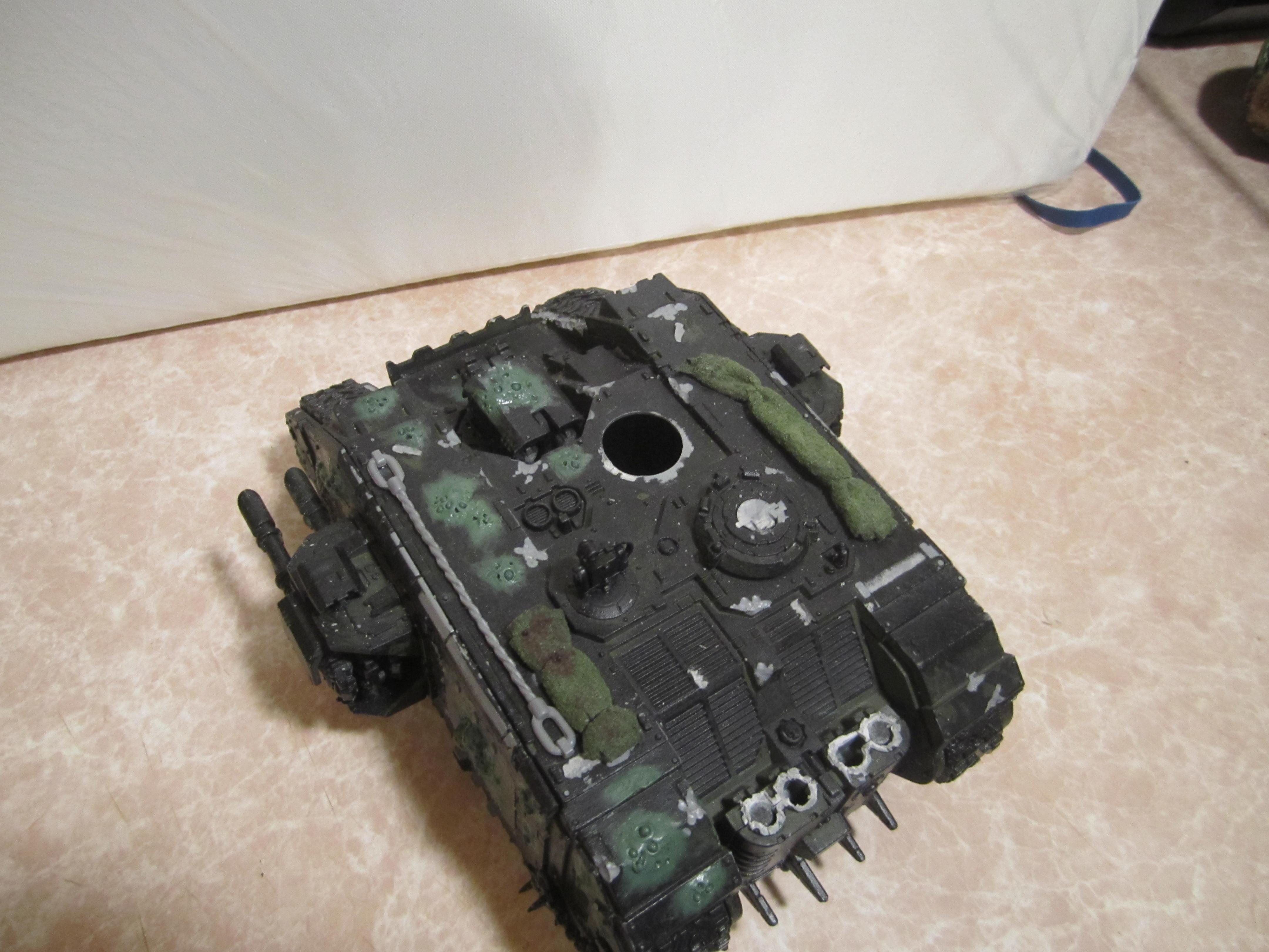 at the back you can see the plague vents that need modifying and the camo netting that i feel turned out well