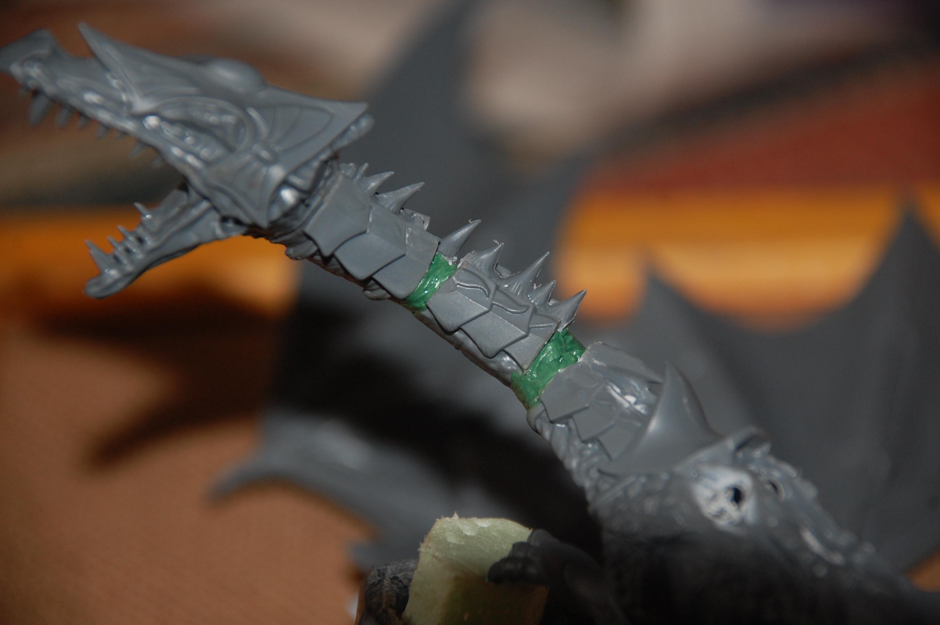 start on rebuilding the neck with greenstuff
