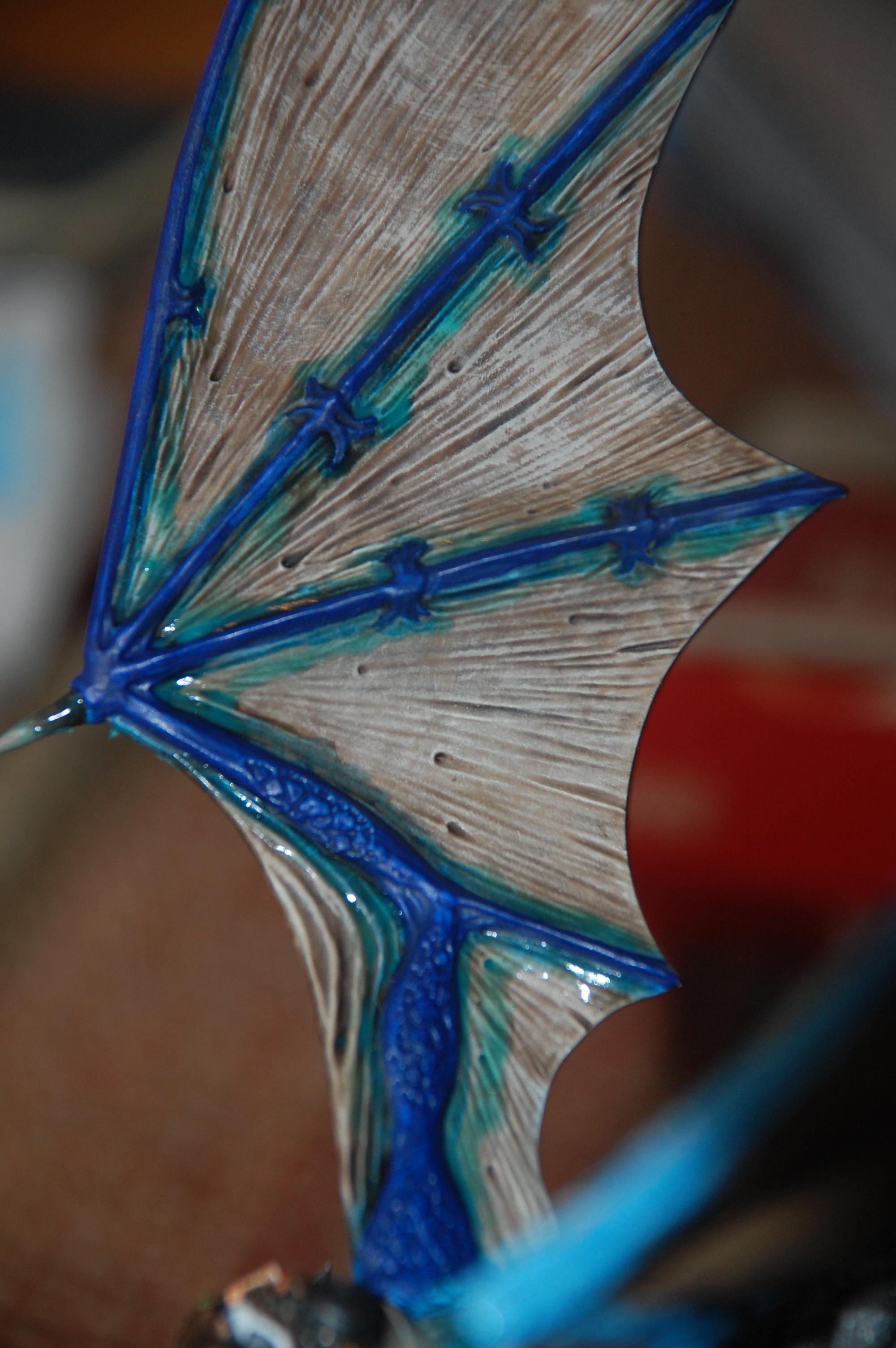 Masked parts of the wings using liquid mask form vallejo