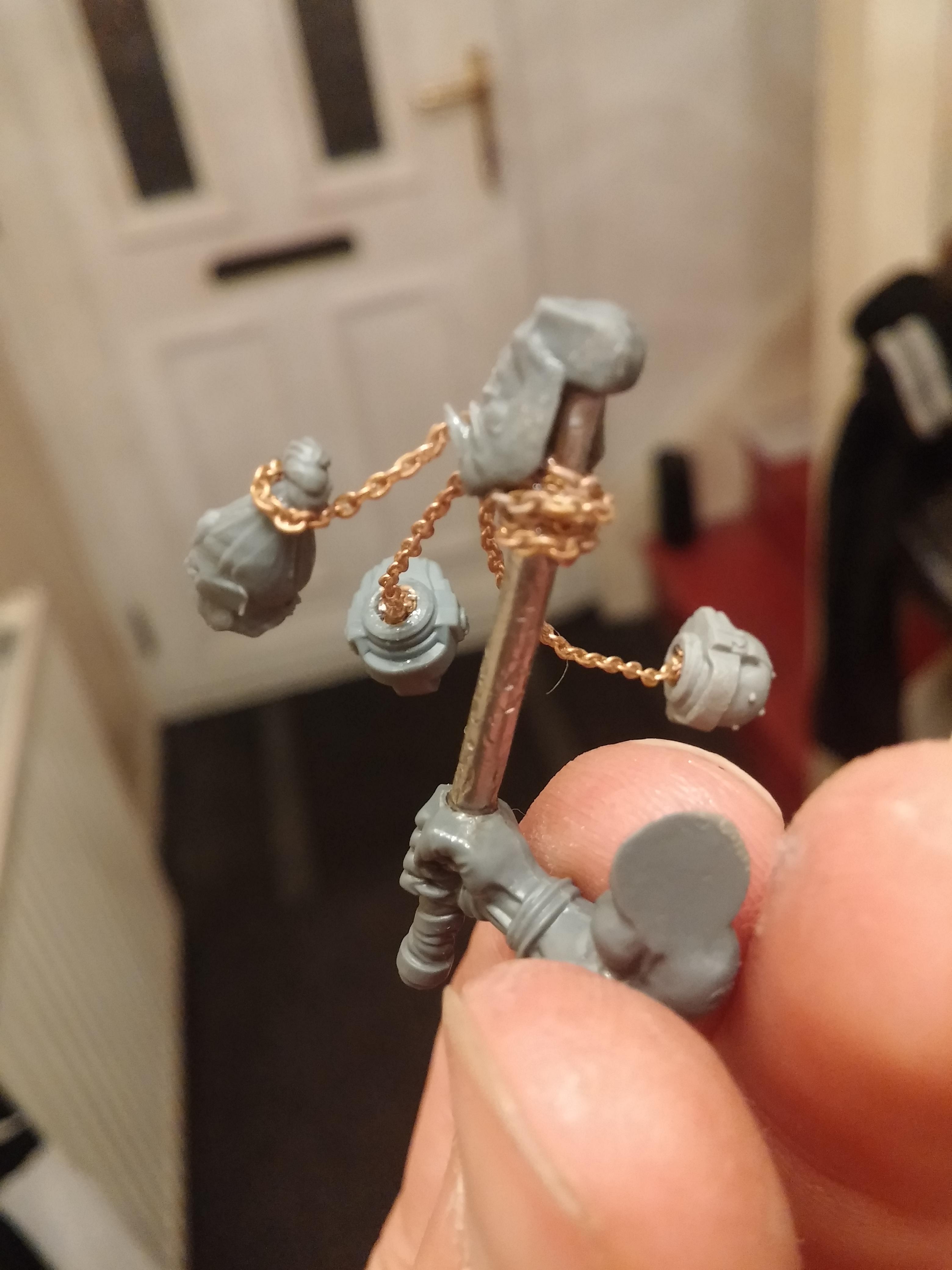 Wrapped the chain at the back for an Orky feel and crushed the rod in a vice for a chipped effect as the pure rod looked odd for an ork