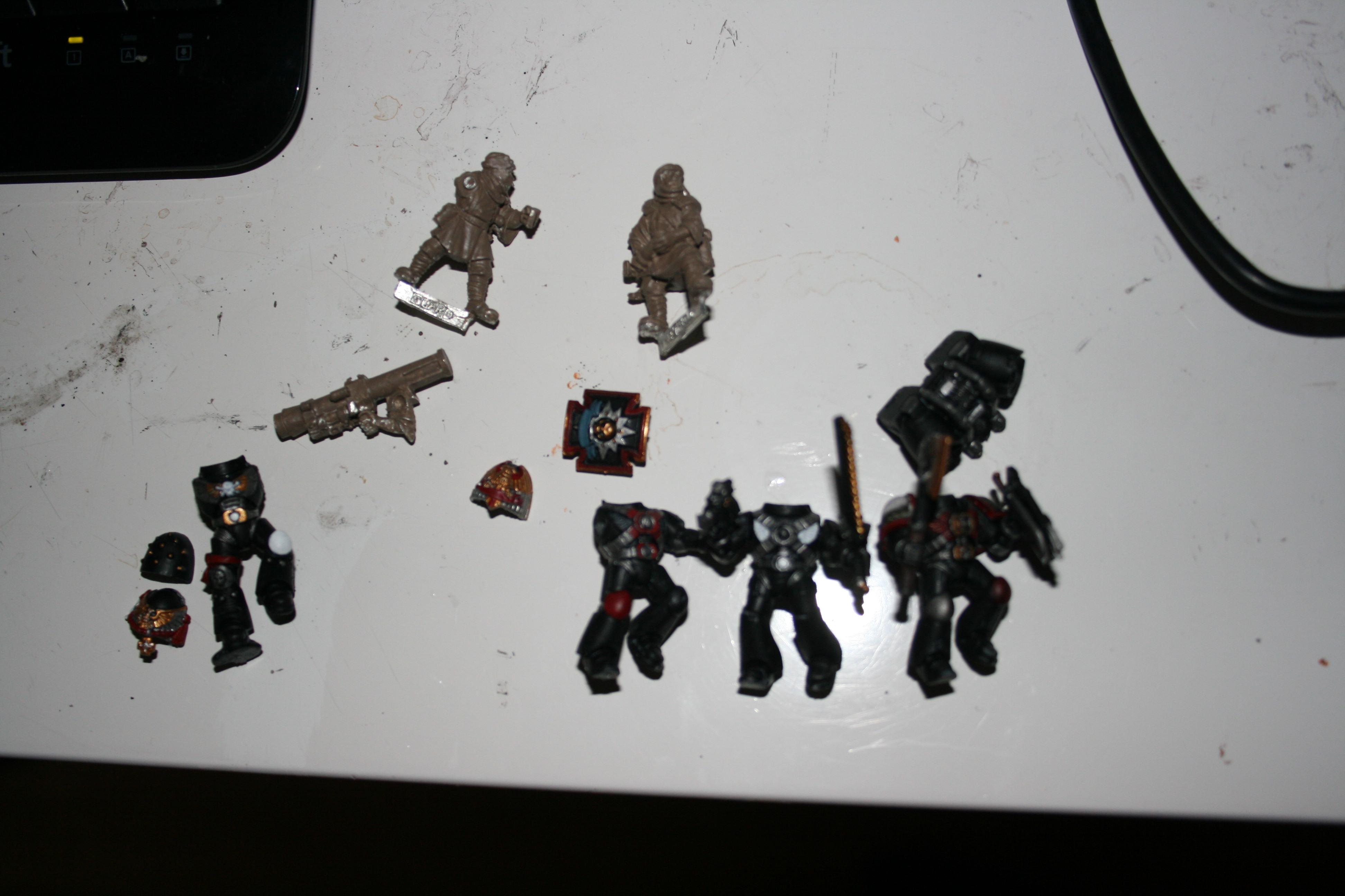 WIP marines,  Left is beginnings of a chaplain with jump pack, Talihan guard missile team, jump pack vanguard with hammer, basic sword n pistol and last a SGT for assult unit. 