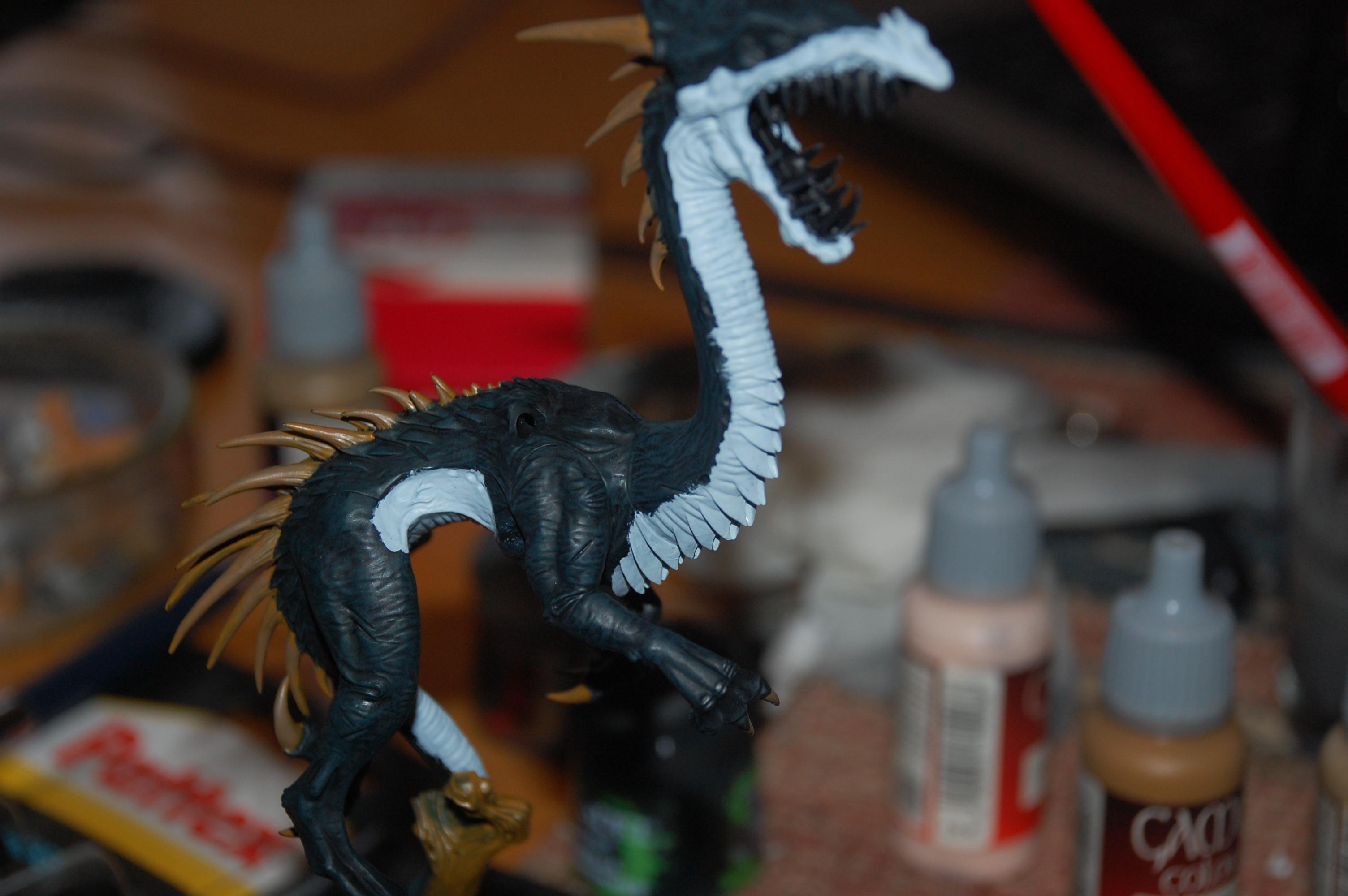 Started painting the fleshy parts of the dragon VGC Wolf grey