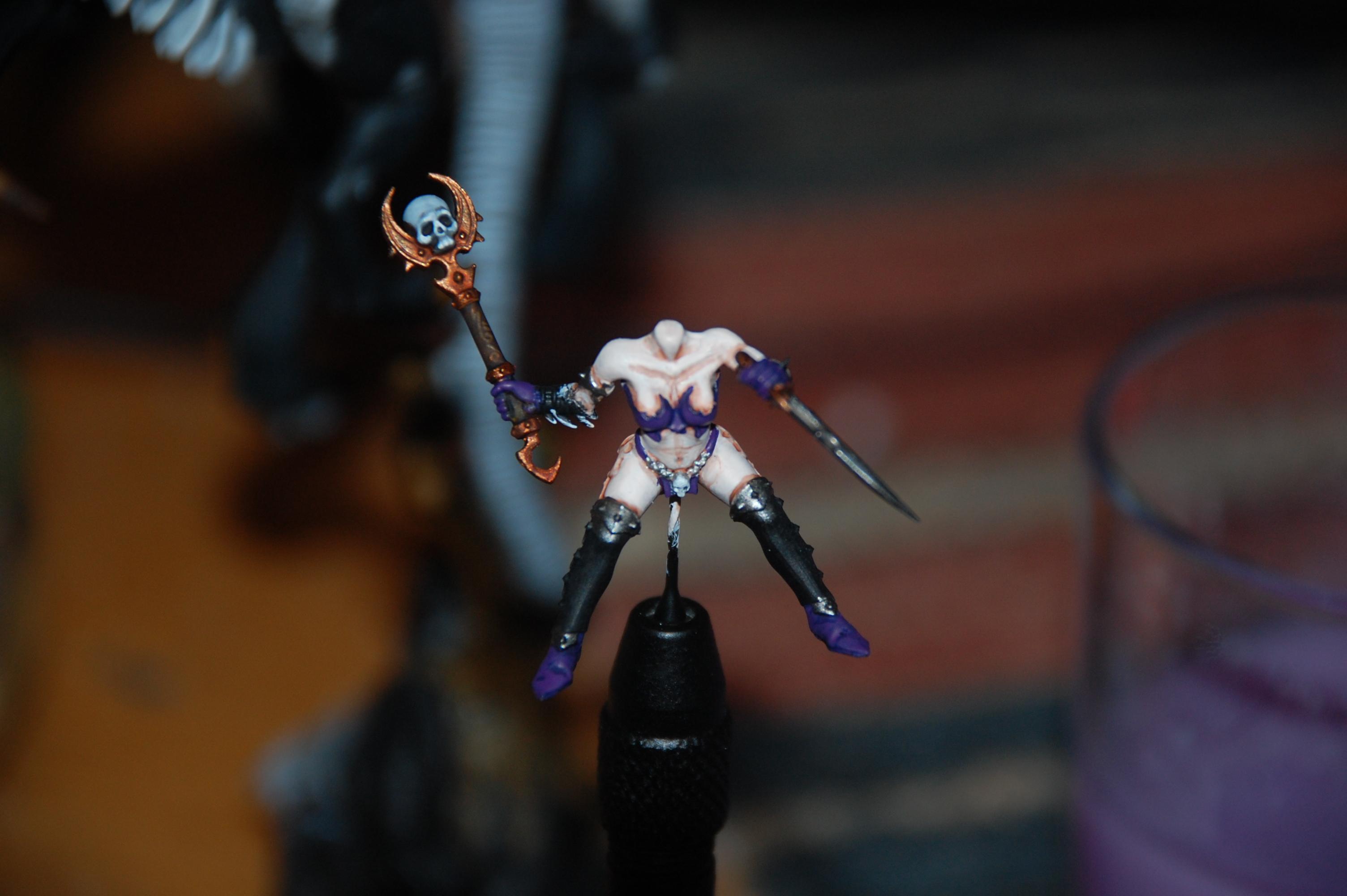 Painted some mettalics with GW Leadbelcher also done some more work to the skull on the staff VGC wolf grey thinned down with water after drying some small edge highlights with VGC off white
